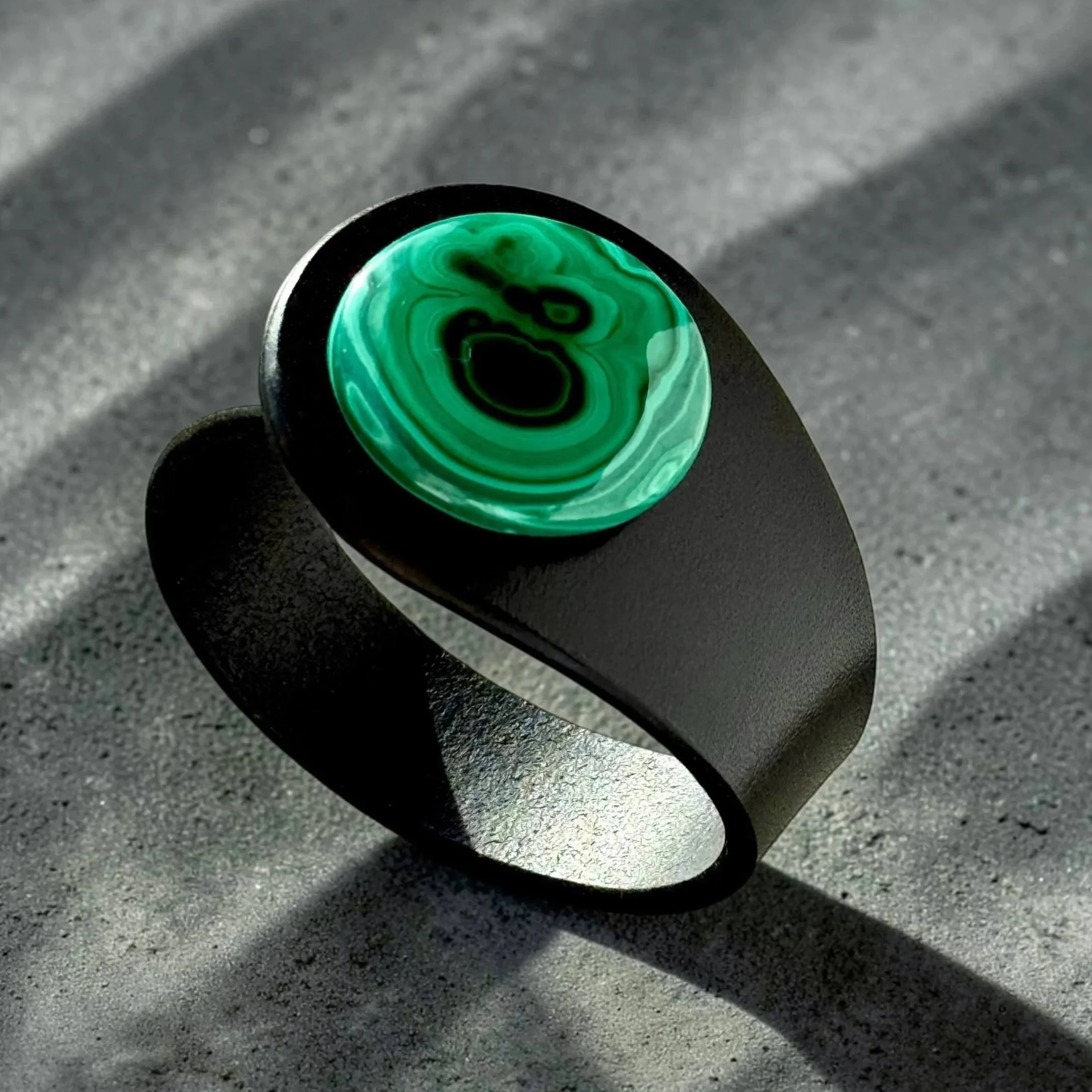 natural-malachite-black-leather-bracelet-on-side-by-freak-like-me.jpg