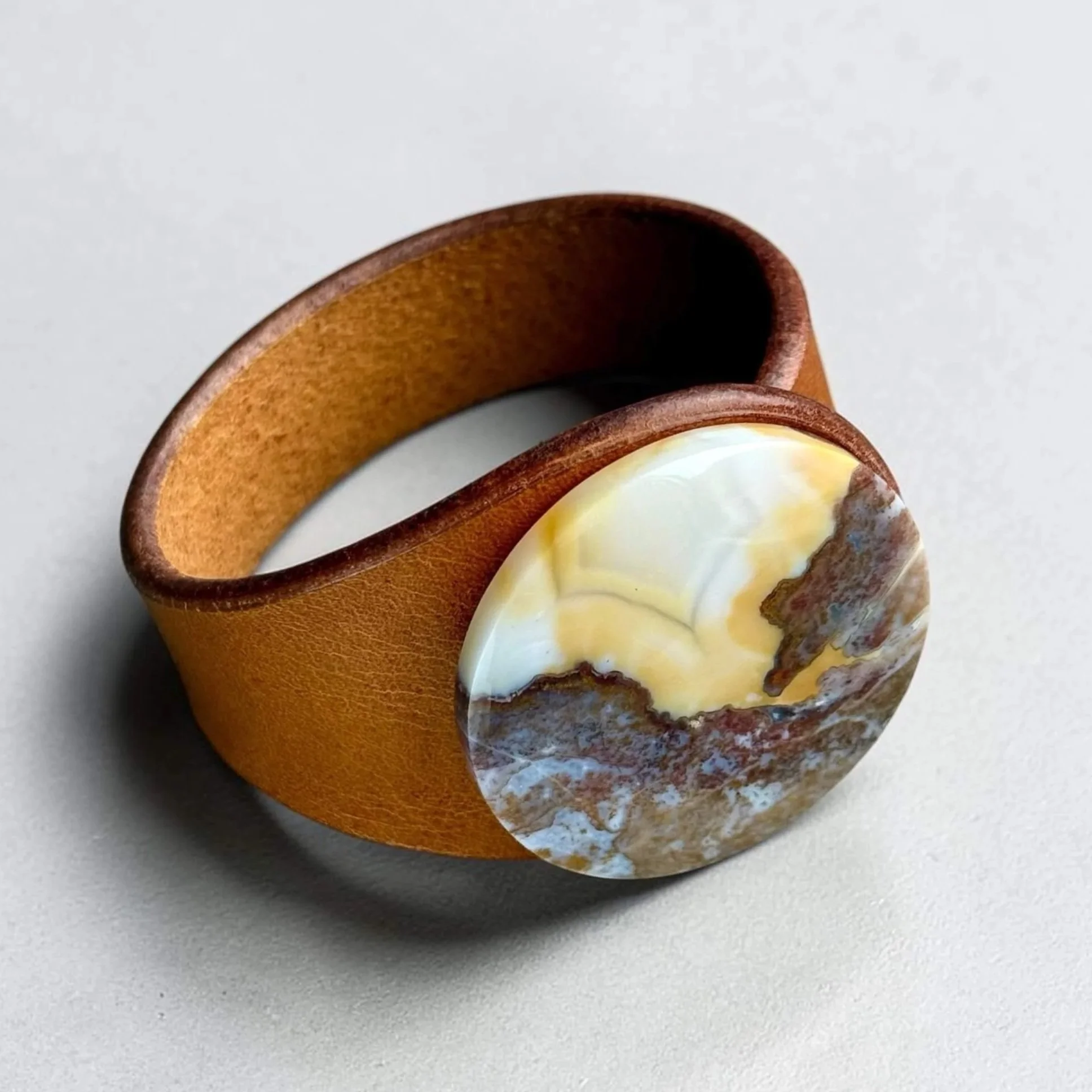 moss-agate-in-jasper-gemstone-brown-leather-bracelet-on-side.jpg