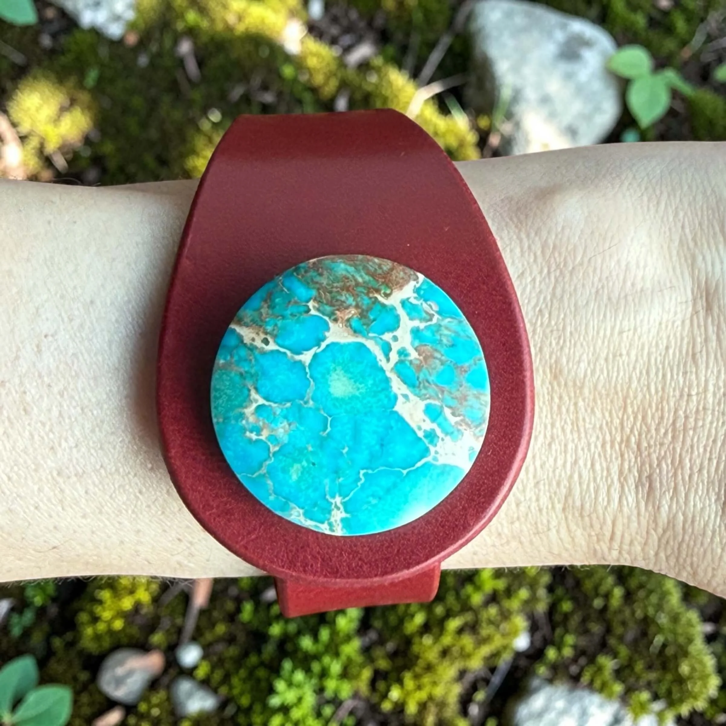 sea-sediment-jasper-red-leather-bracelet-on-wrist.JPG