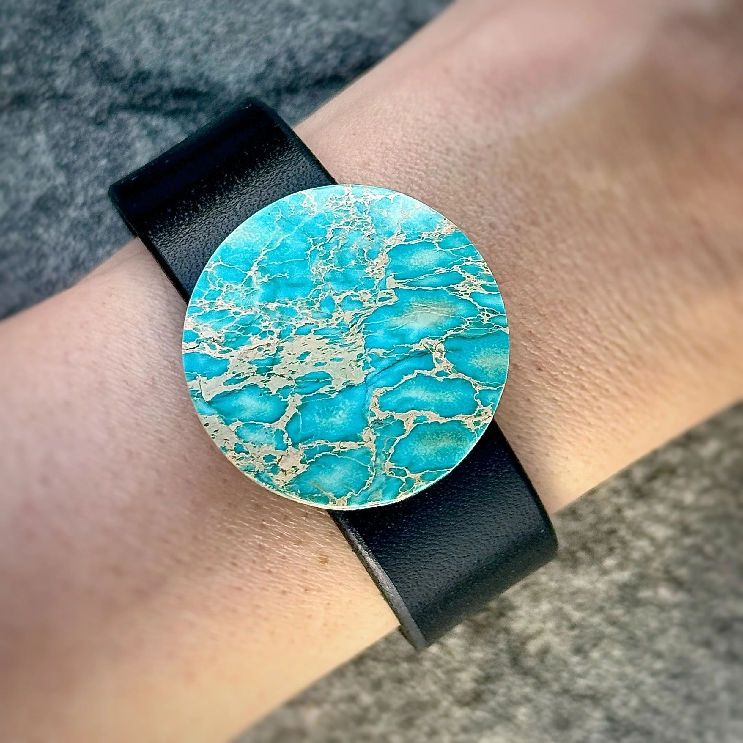 natural-sea-sediment-jasper-black-leather-bracelet-on-wrist
