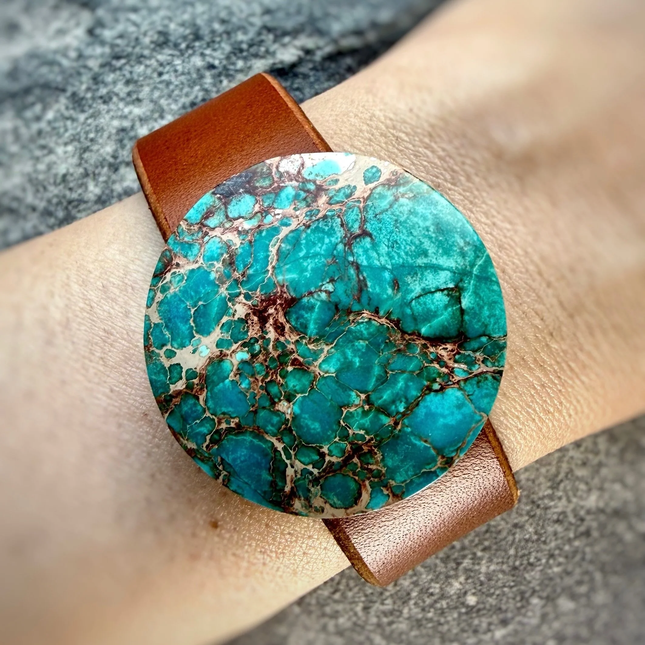 sea-sediment-jasper-brown-leather-bracelet-on-wrist.jpeg