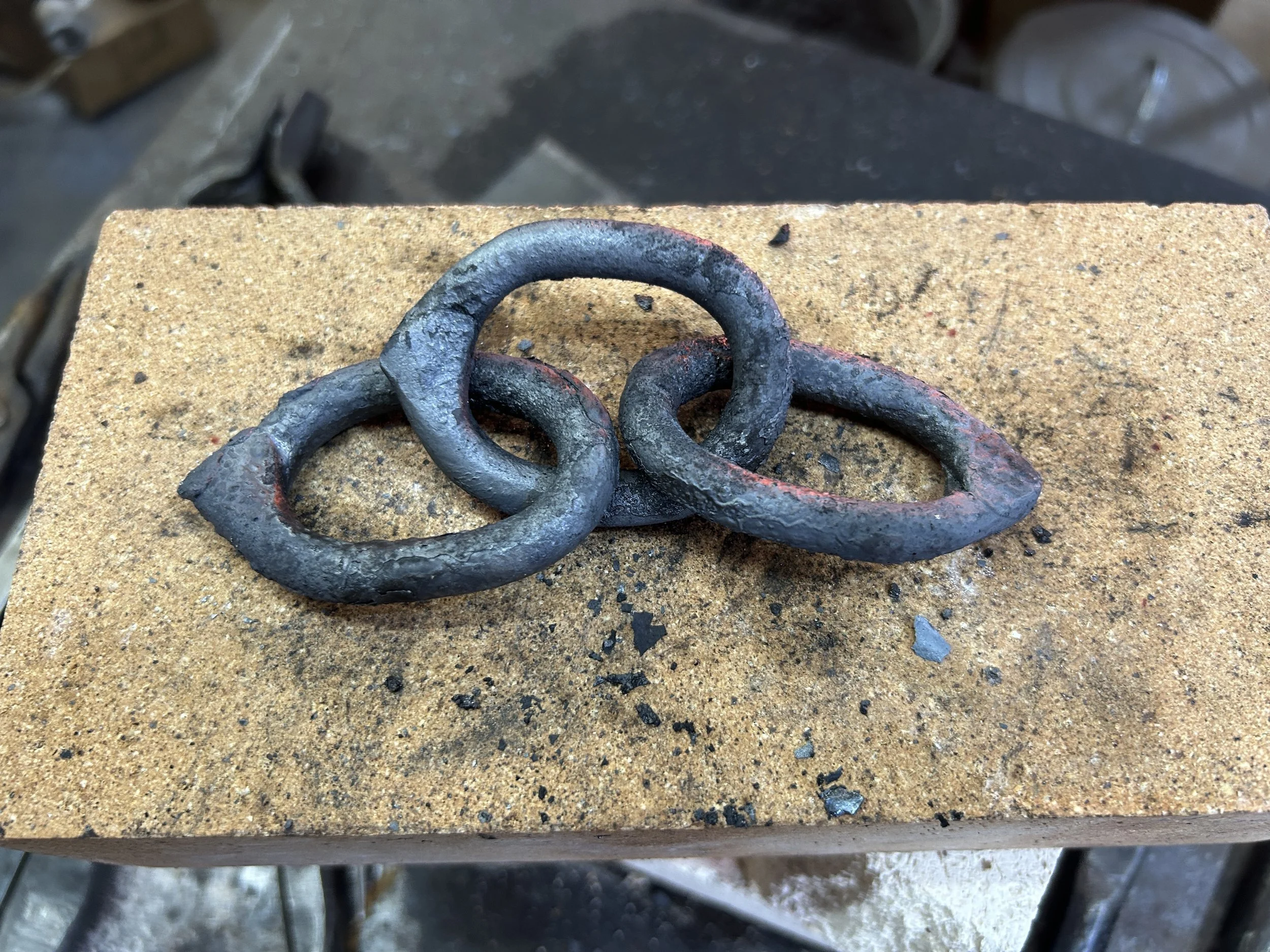 Chain still crusty from the forge.