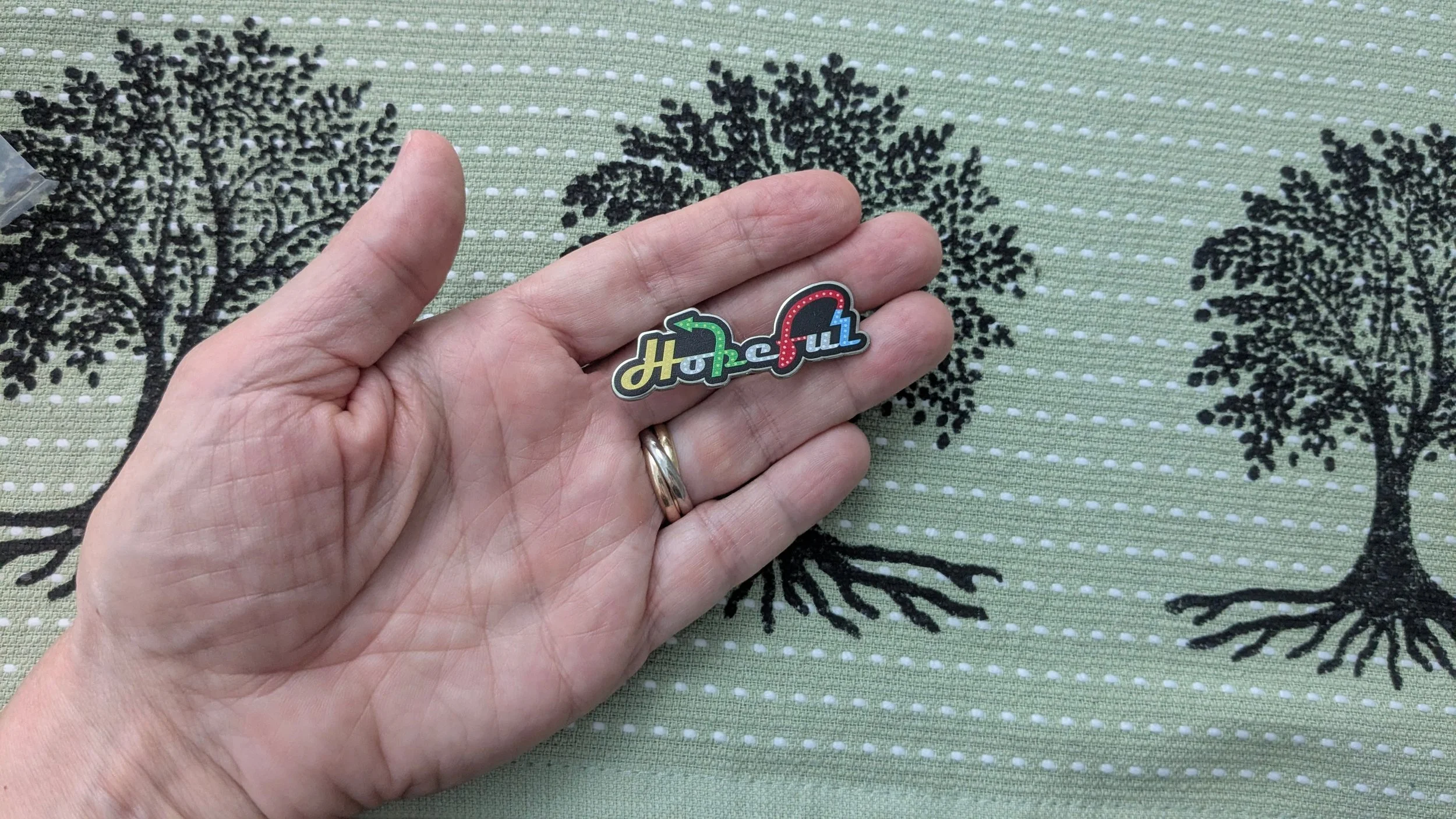 Hopeful pin and hand.jpg