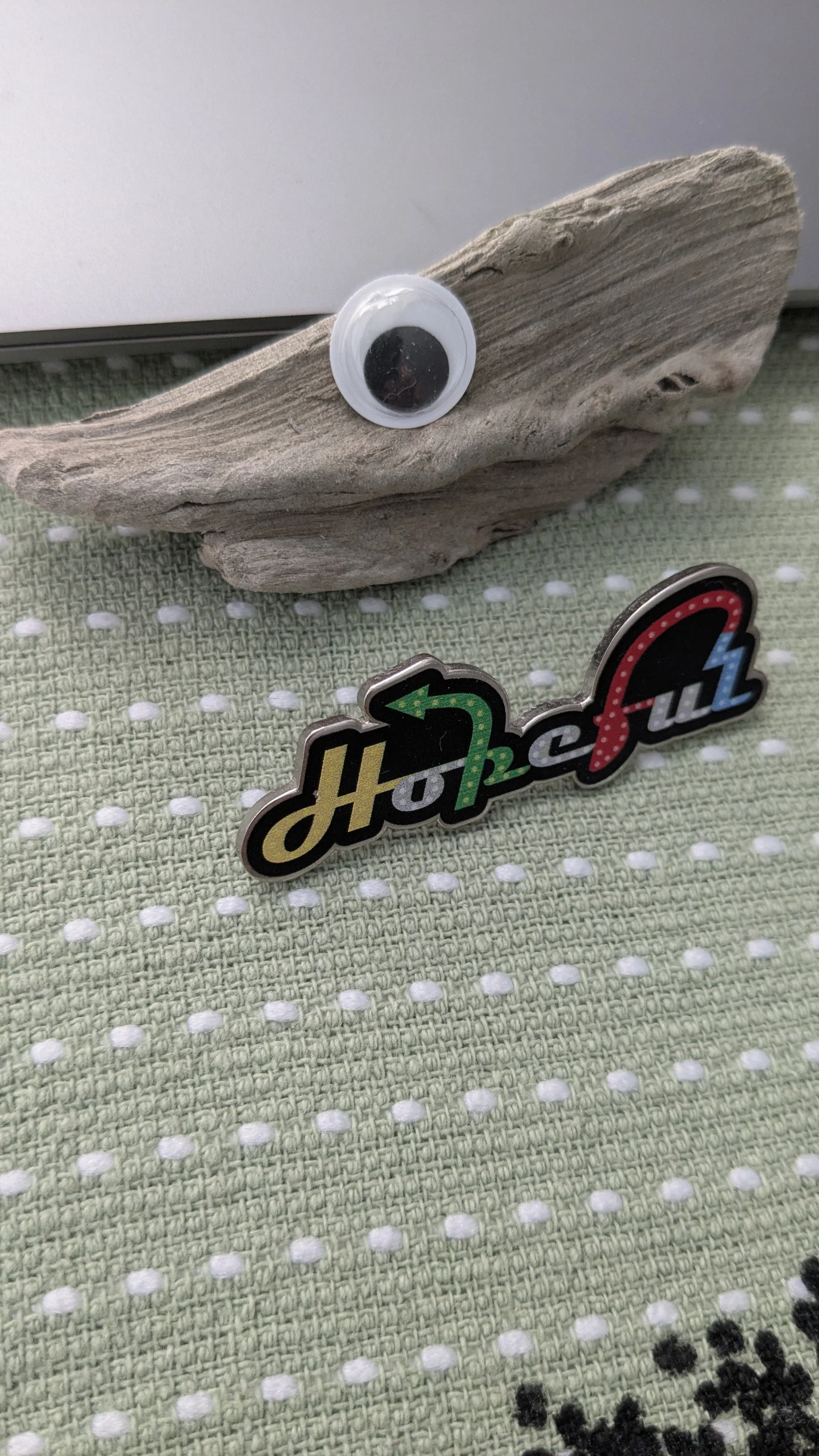 Hopeful pin and googley eye.jpg