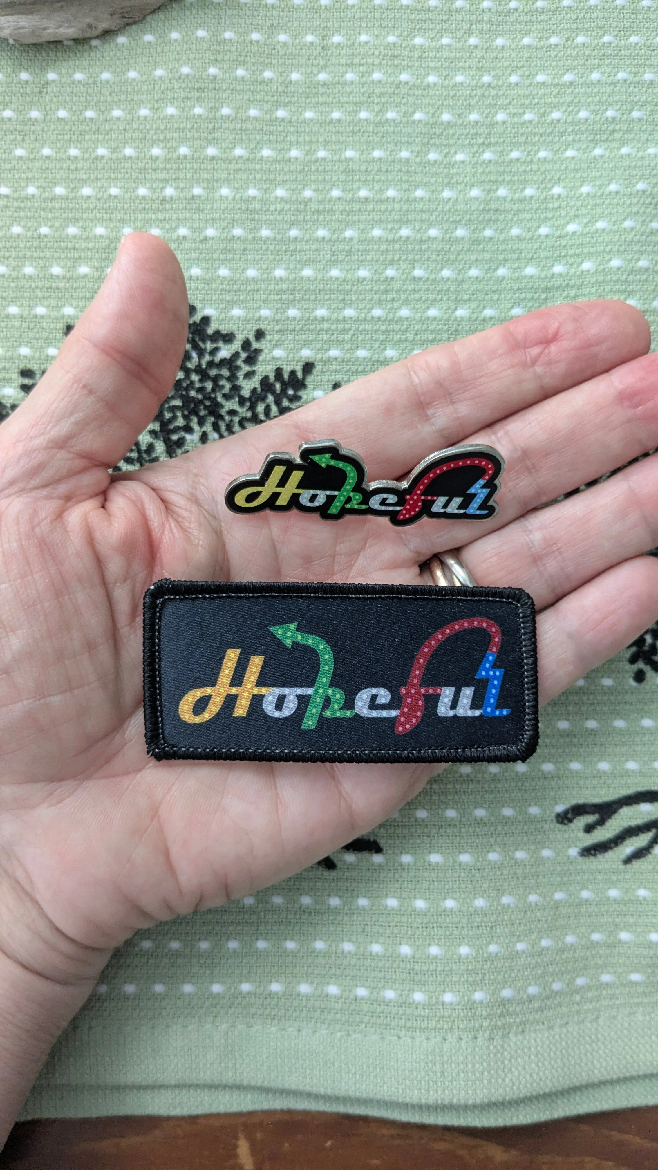 Hopeful pin and patch.jpg