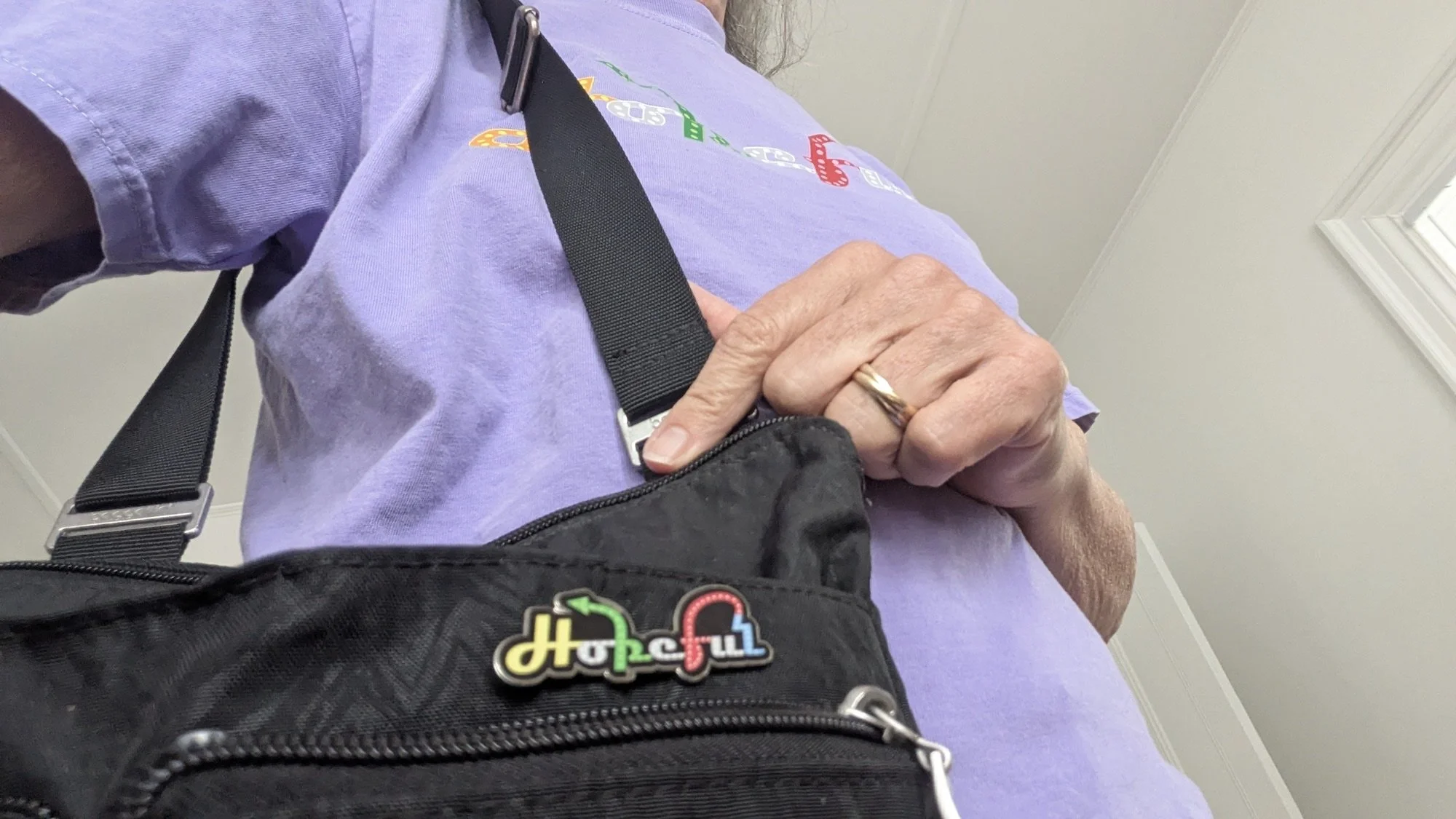 Hopeful pin and purple tee.jpg