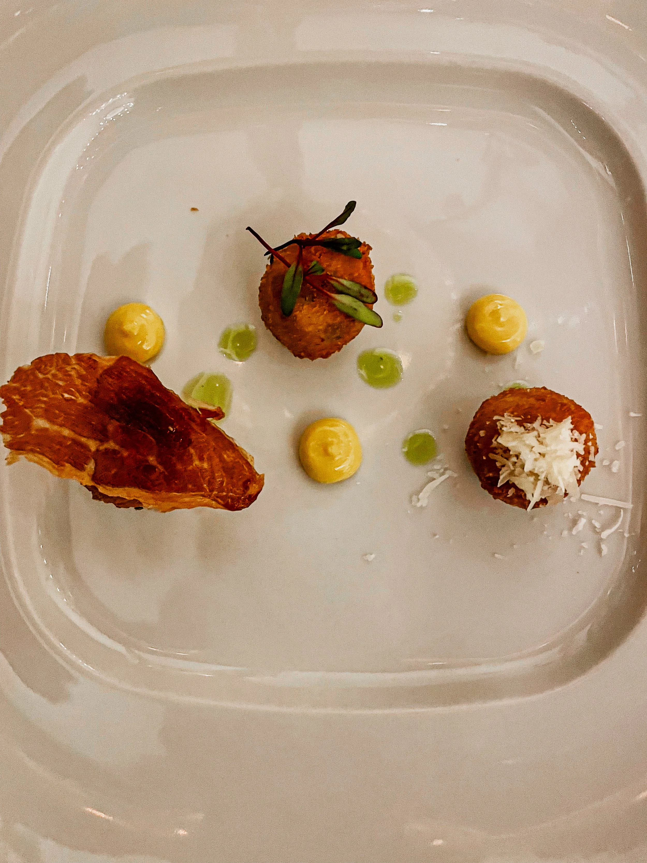 Small gourmet bites from a fancy restaurant in San Miguel de Allende