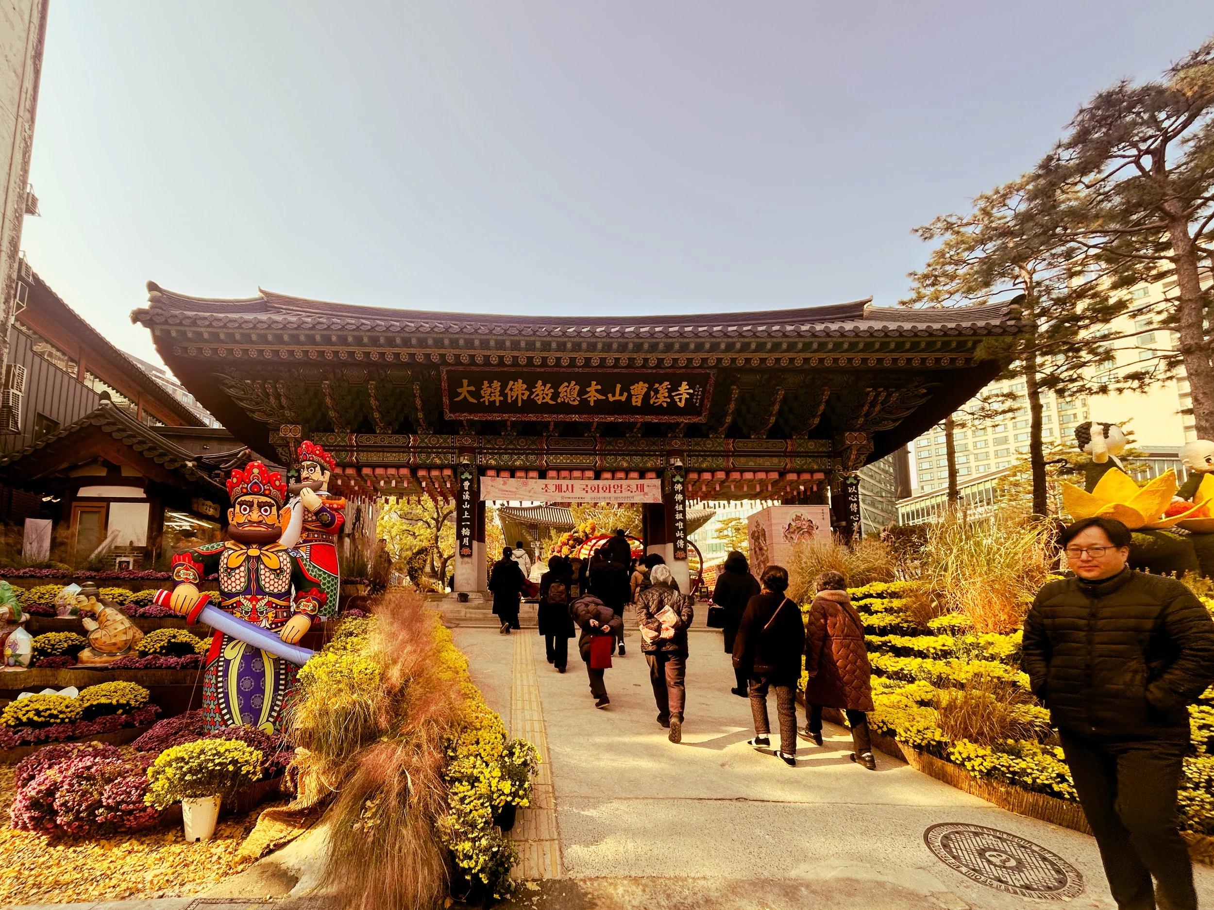 Jongmyo shrine in Seoul surrounded my people and fall colors