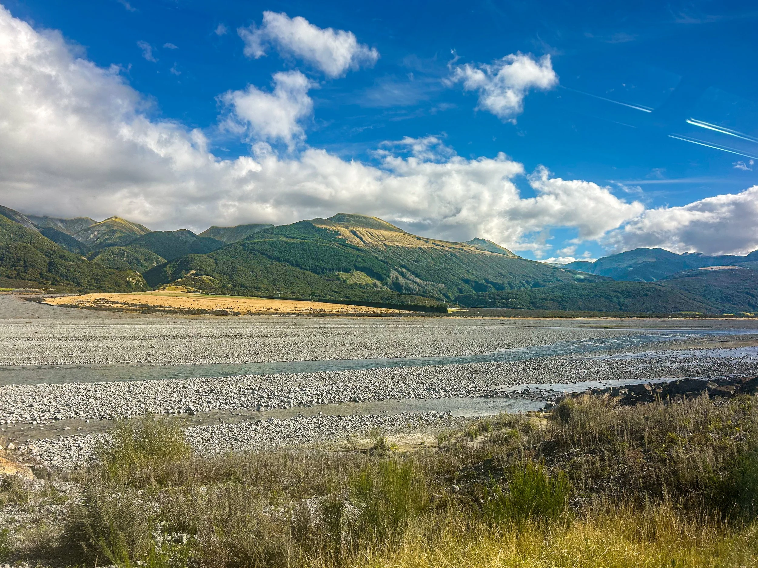 a picture of a dried out riverbed from the TranzAlpine train