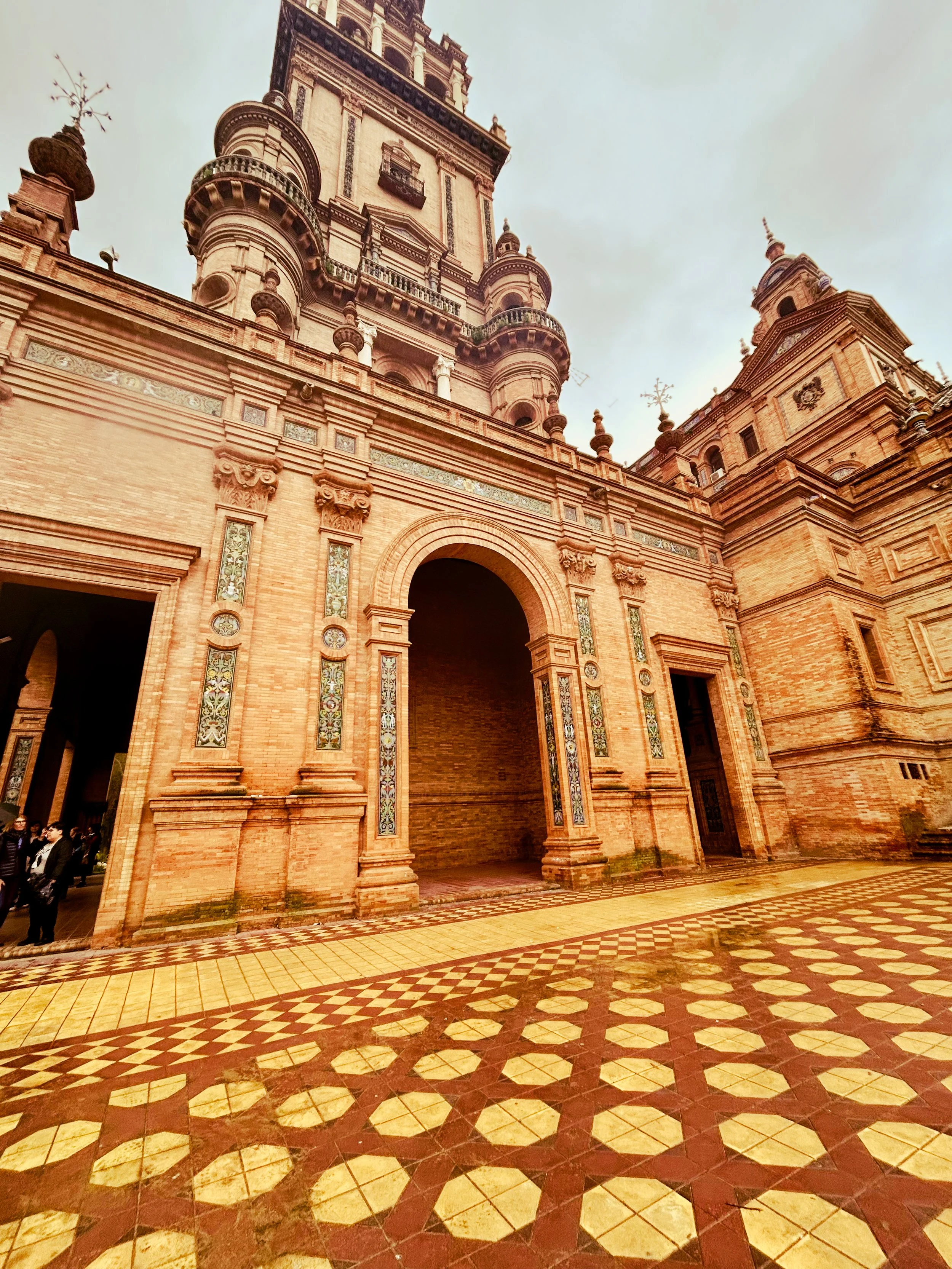 Tile and a building at the Plaza de España in Seville, Spain