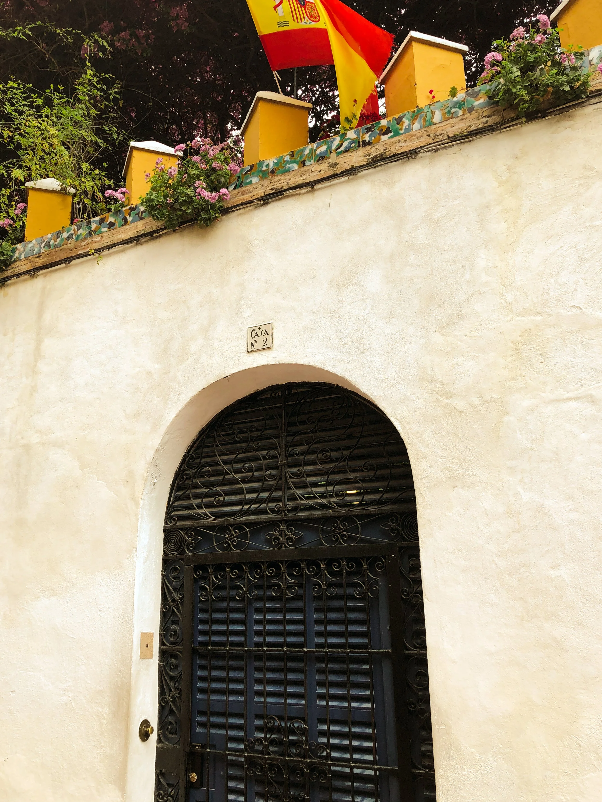 The Spanish Flag flying over a villa door in Seville