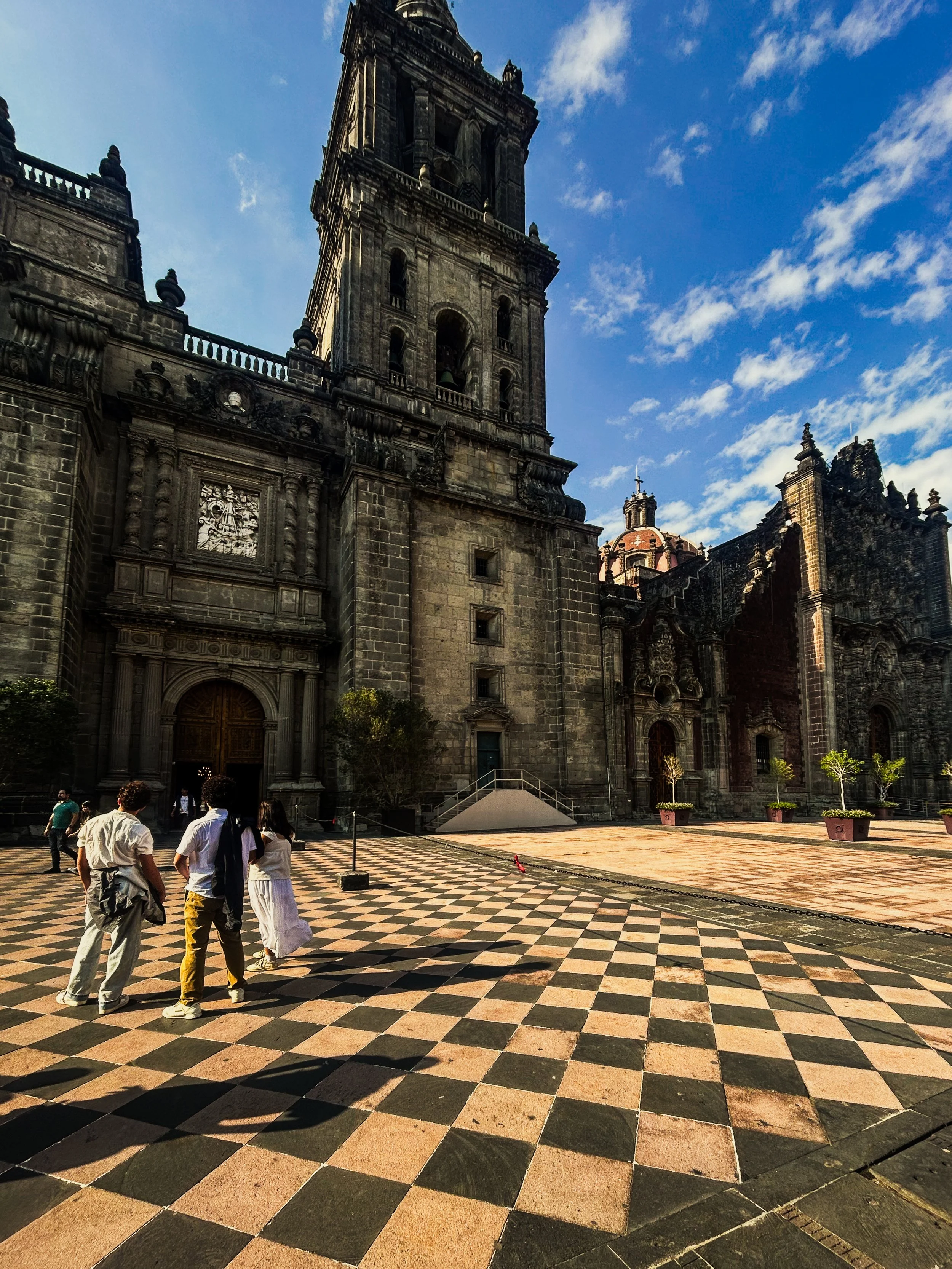 Tiled Old Town plaza in front of the Mexico City Metropolitan Cathedral