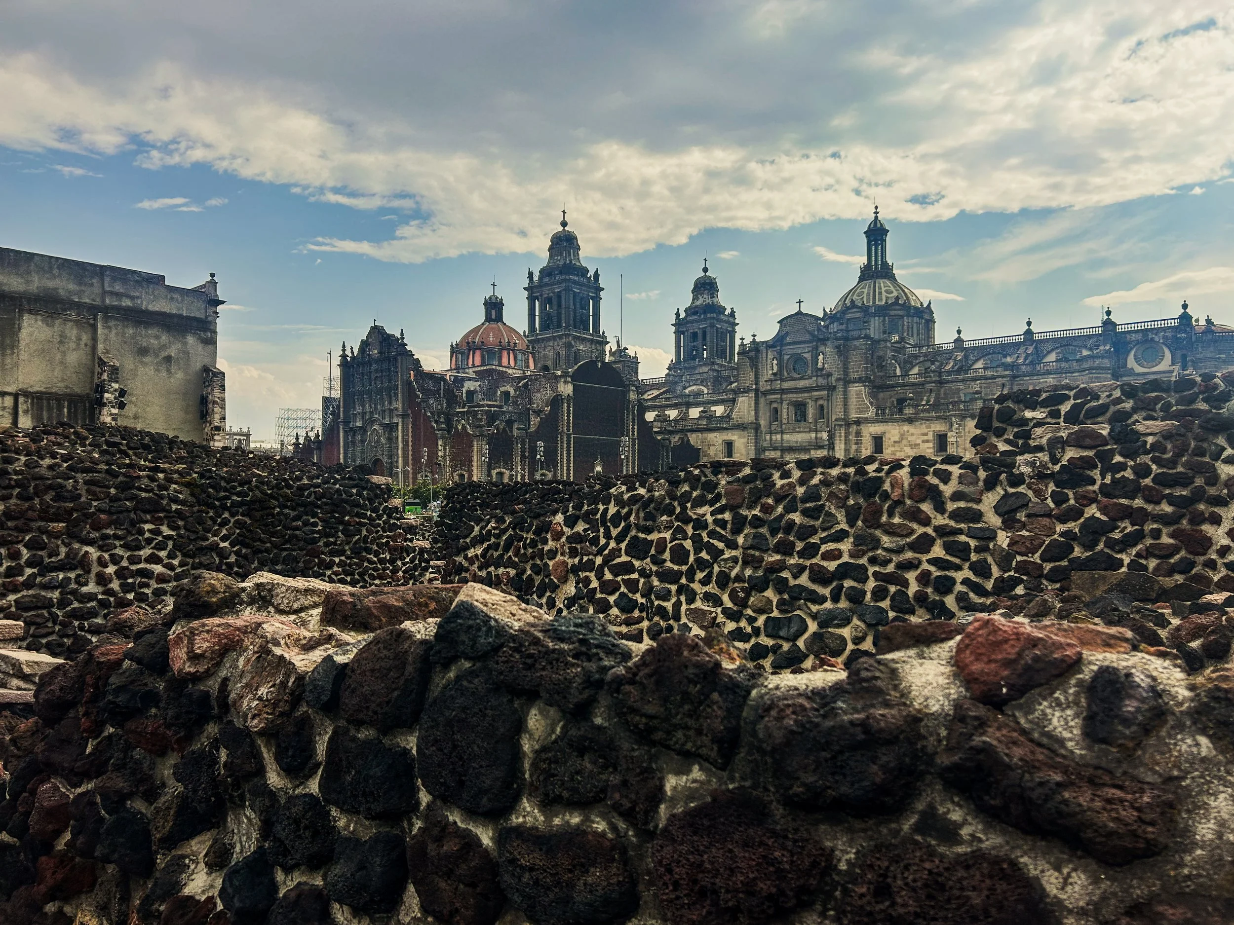 A wide shot view looking out to old town Mexico City from the Templo Mayor Museum ruins