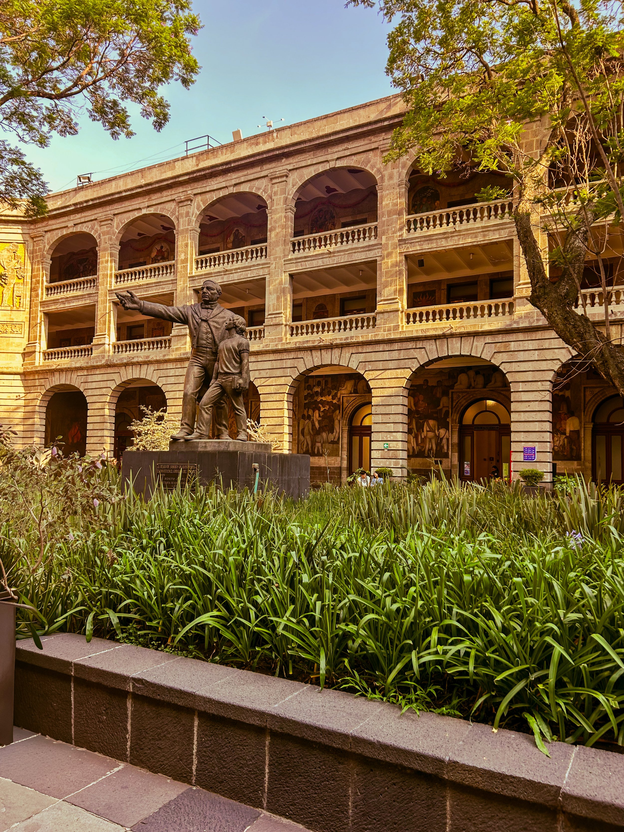 View of the sun-drenched courtyard at Mexico City's Museo Vivo del Muralismo