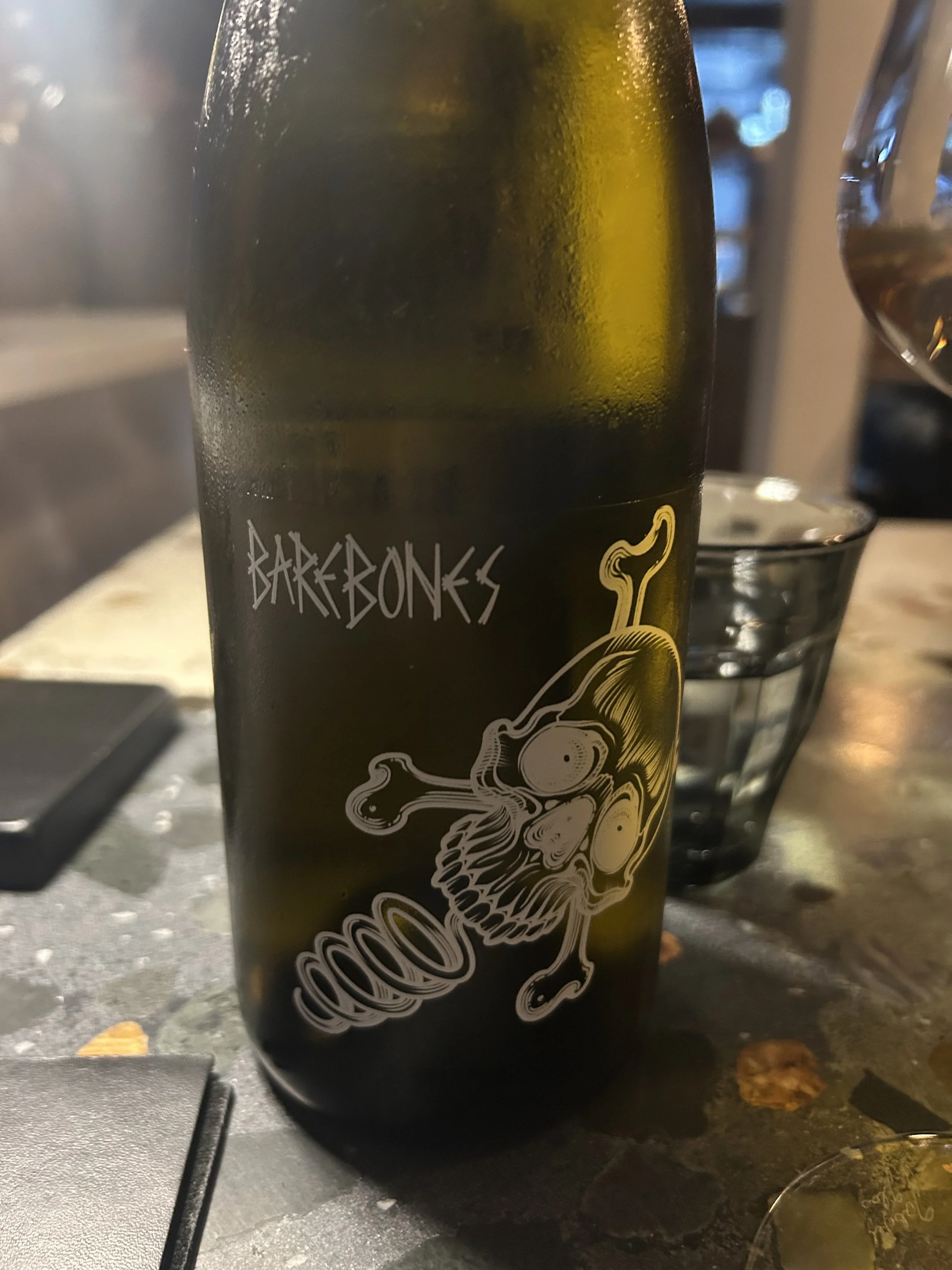 closeup of tattoo artist label on The Blacksmith Wines at Seebamboes in Cape Town, South Africa