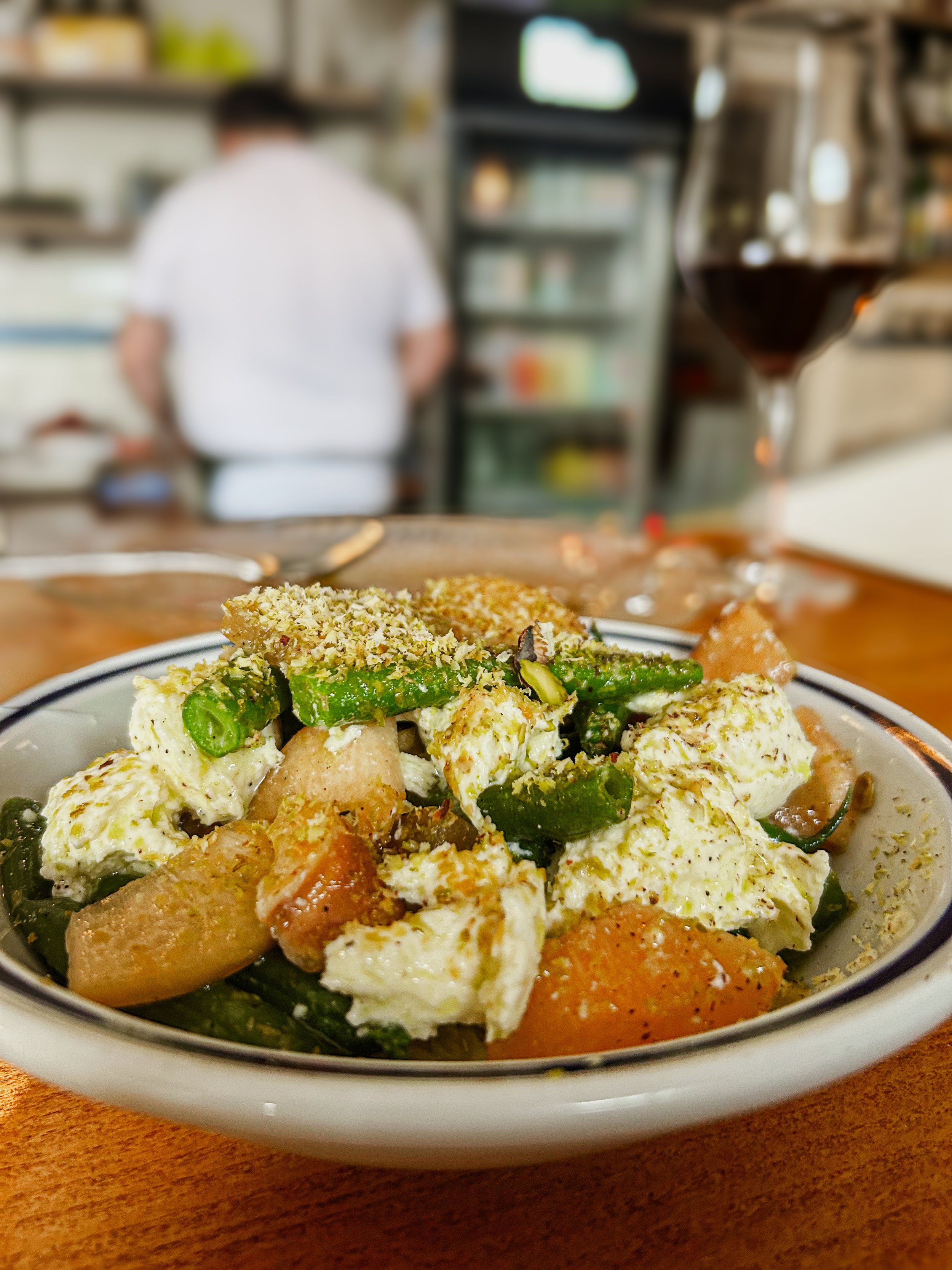 Green beans with stracciatella, nectarines and crushed hazelnuts at Margot in Wellington, New Zealand