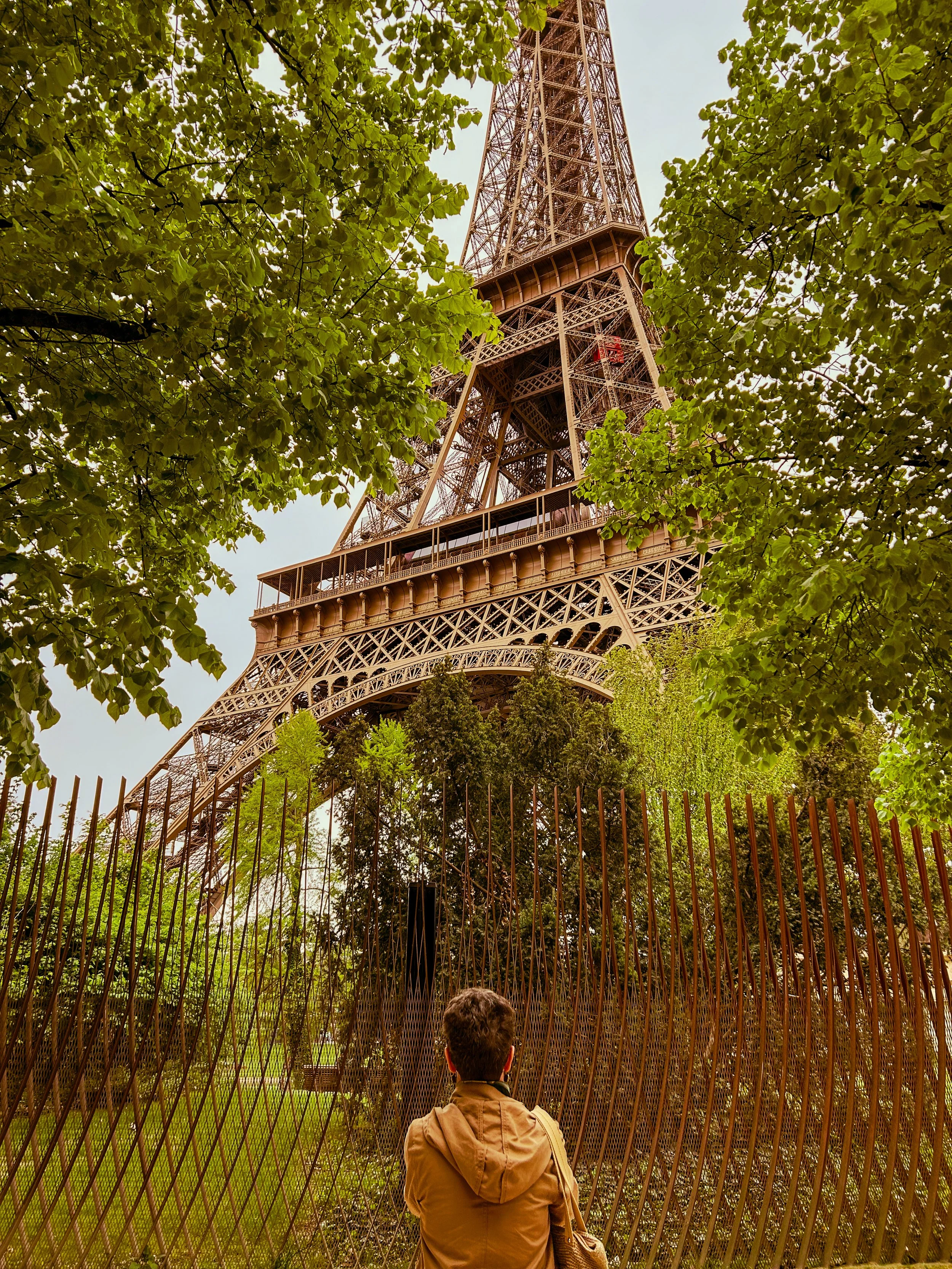 The Untethered Traveler's mother at the base of the Eiffel Tower