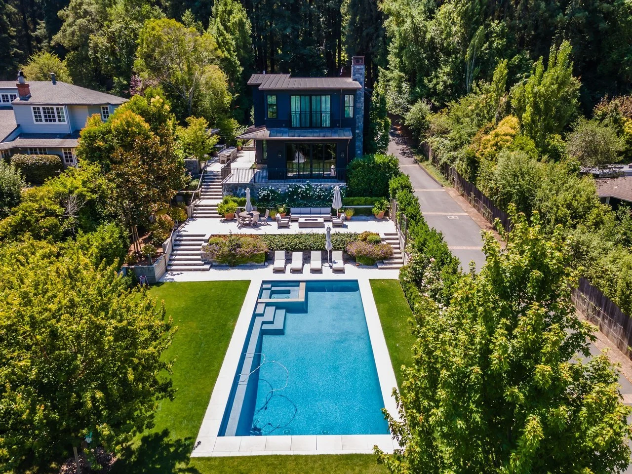 Hillside landscaping featuring terraced beds and modern landscape design in Ross, CA