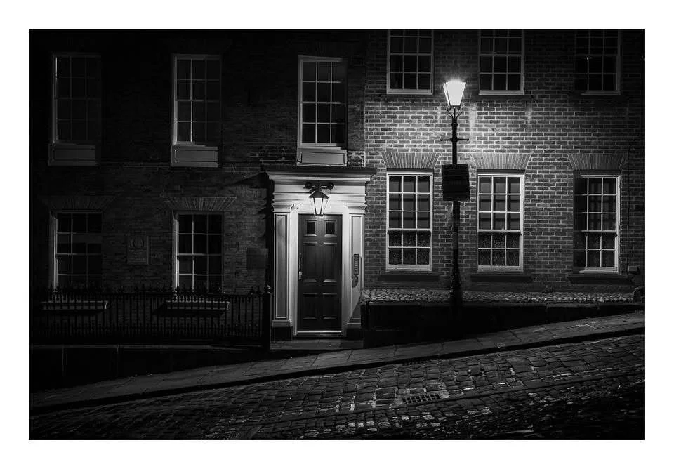 Photo by Martin Levers - "At first I didn’t know why I loved this image, maybe it’s simplicity, maybe the light hitting the building, maybe the light on the door, maybe the angle of the road, but I think it’s because I wouldn’t have seen it. I wouldn
