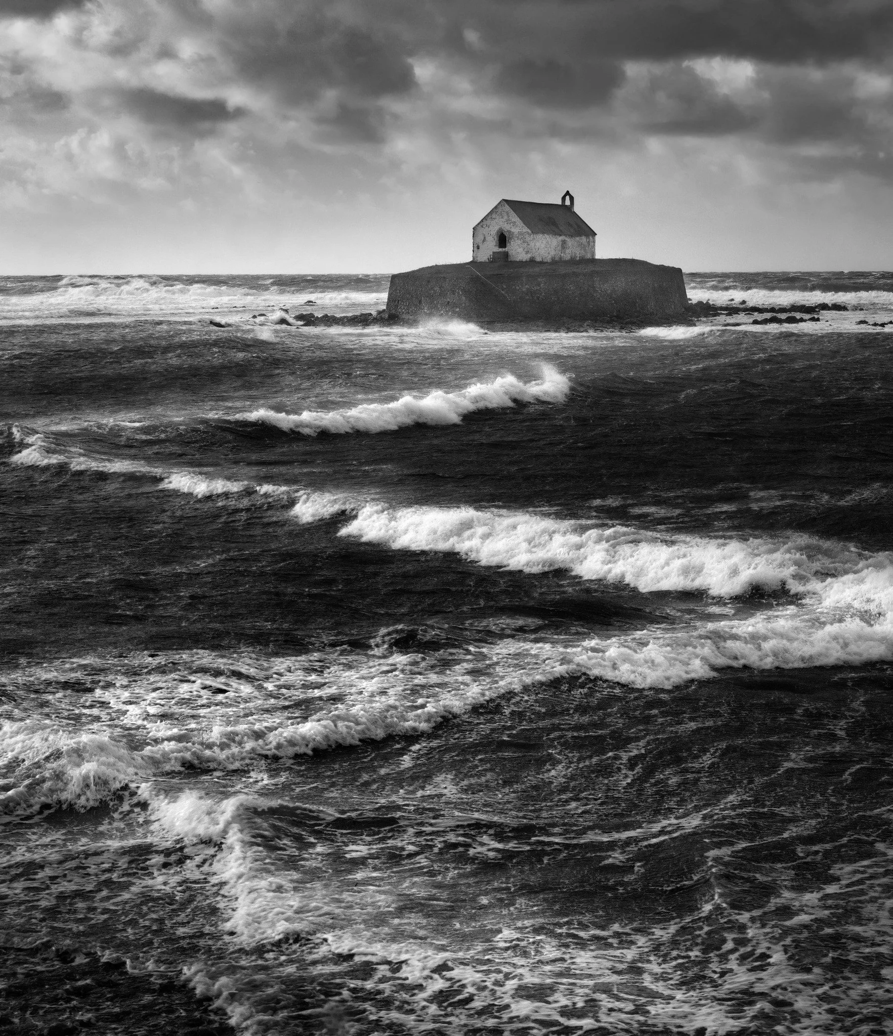 Photo by David Griffiths - "The way the waves break and draw you on a journey towards the church. Simply sublime..” - Garry Sugden