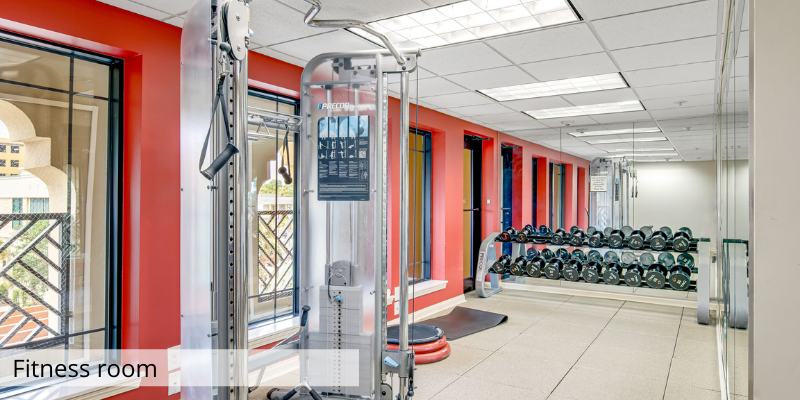 Fitness-room-with-weights.png