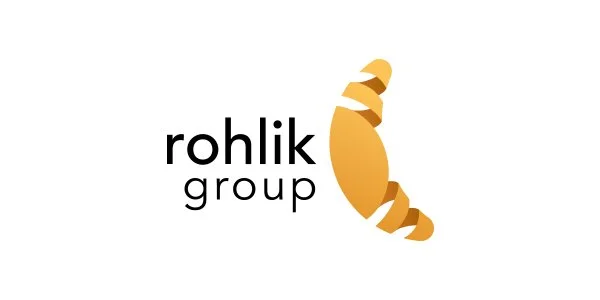 Rohlik Group logo featuring a stylized croissant and the company name.