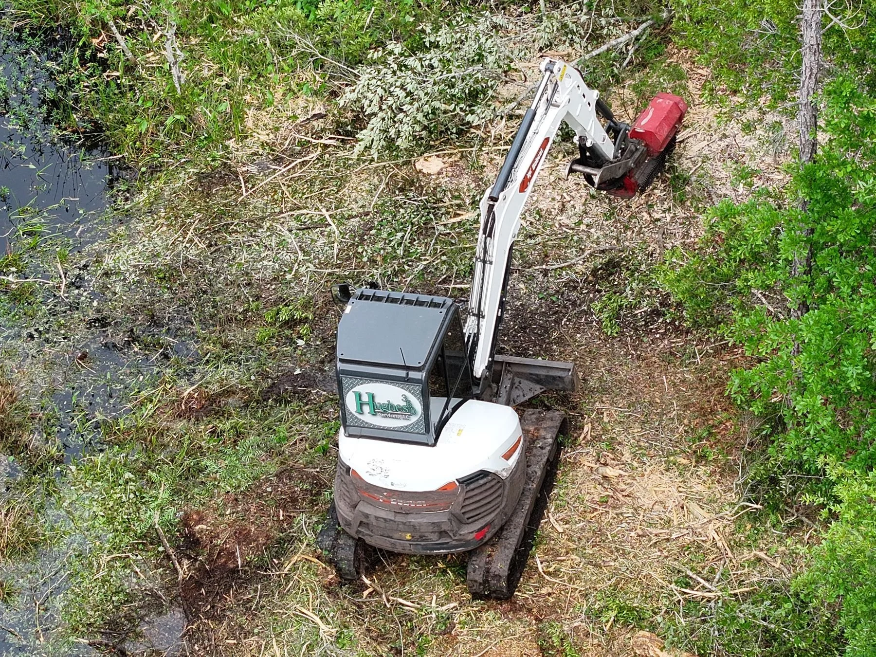 Creek and drainage right-of-way clearing by Hughes 360 Services