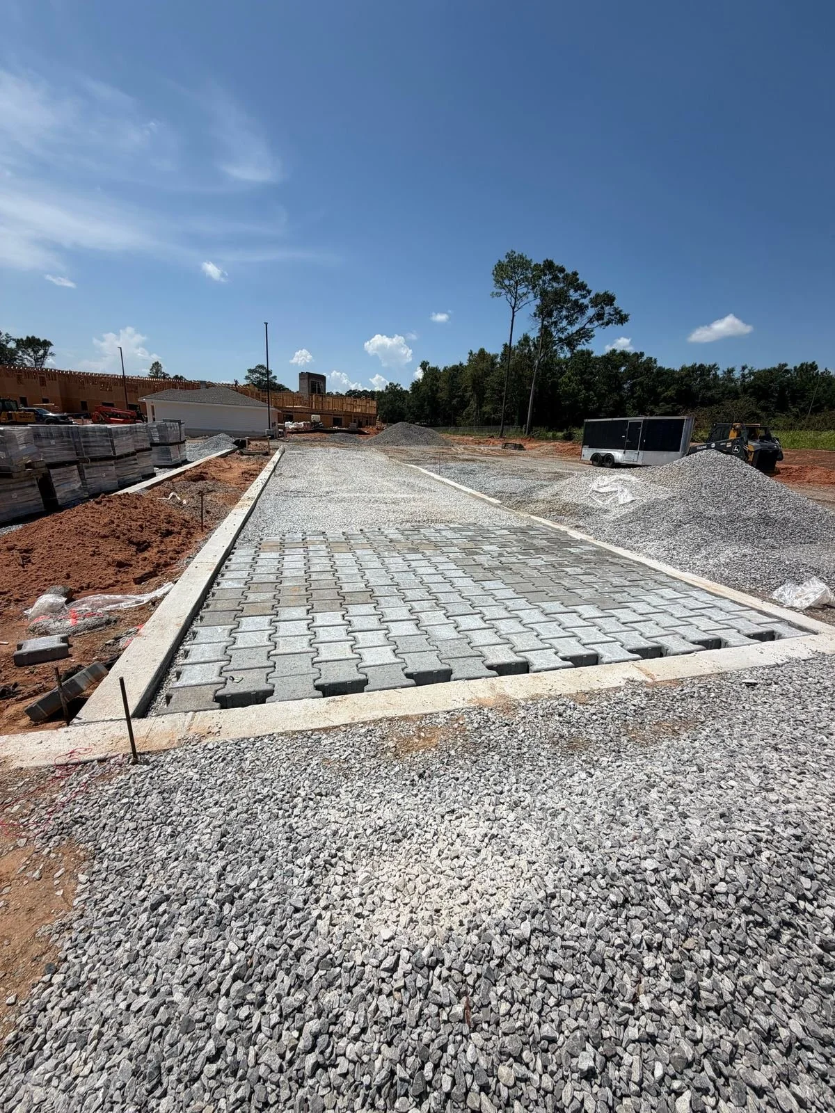 Site Work: Permeable Paver Lot & Retaining Wall — finished permeable paver parking lot, Hughes 360 Services