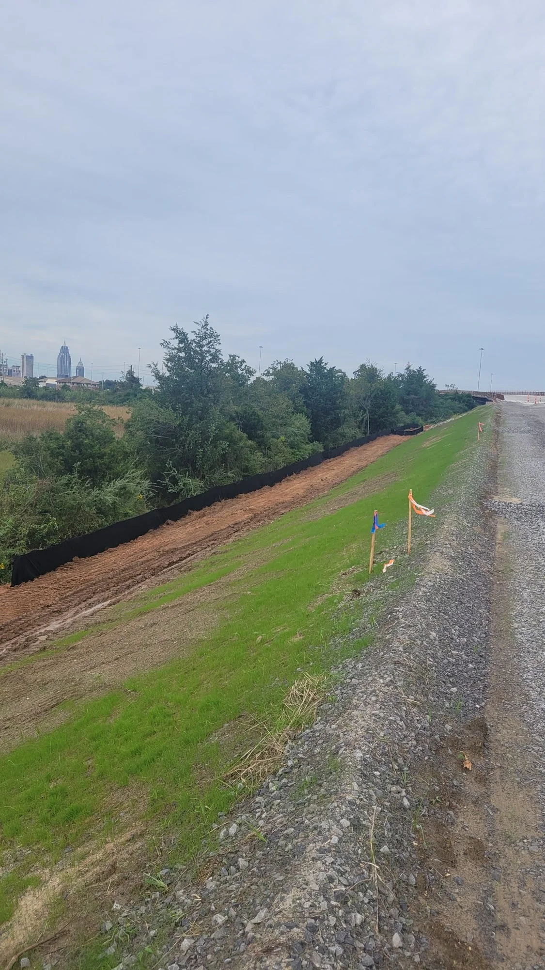 Erosion and sediment control, Mobile, AL — completed bank stabilization, Hughes 360 Services