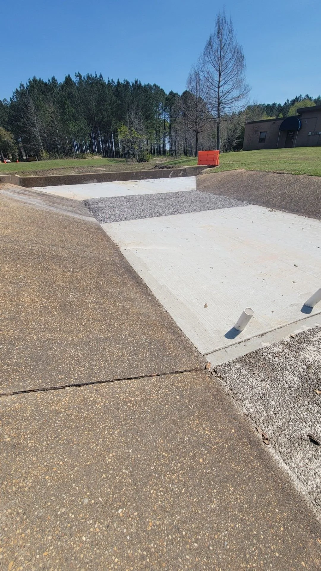US Coast Guard Drainage Channel Repair — completed drainage channel after repair, Hughes 360 Services