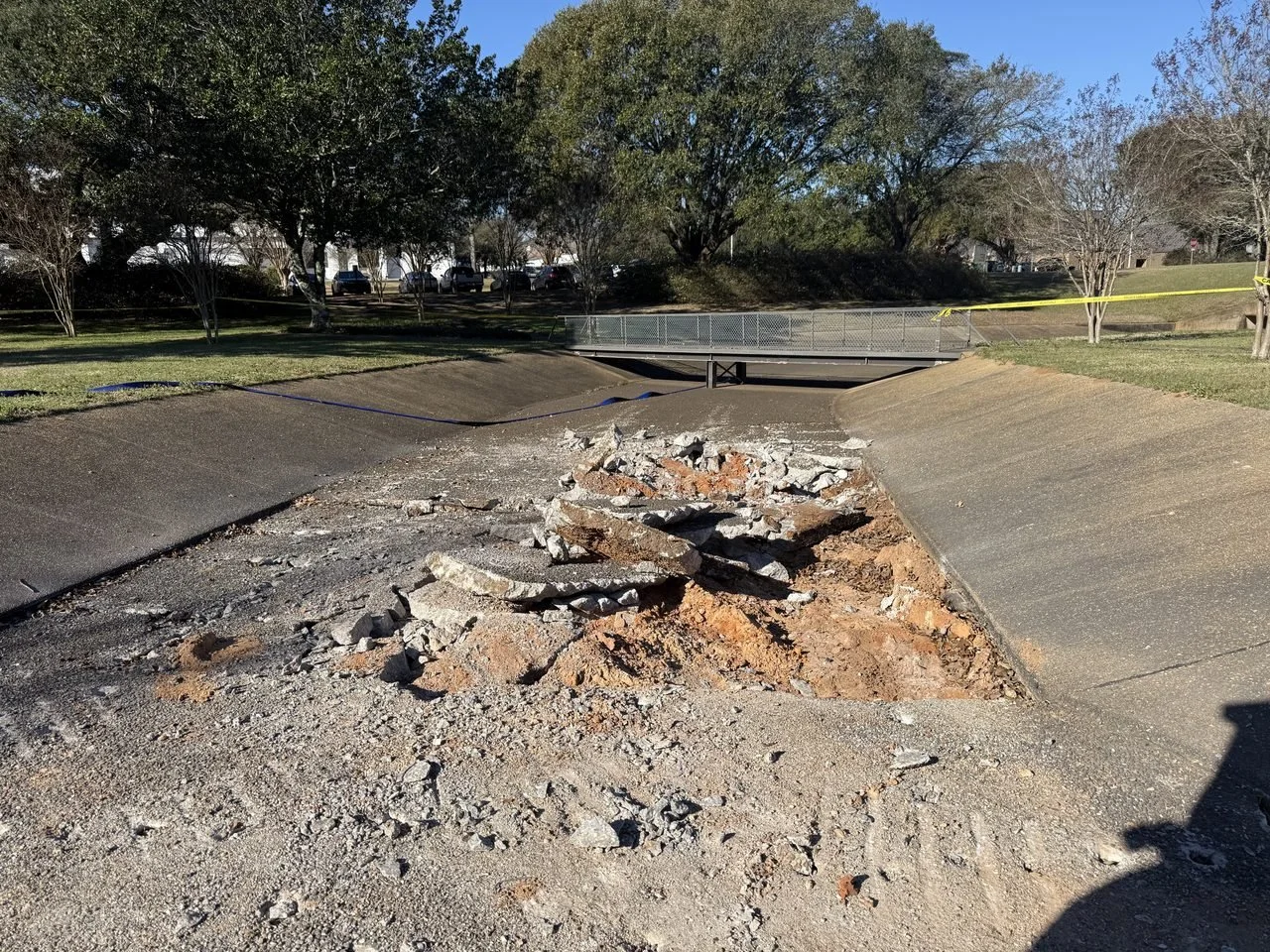 US Coast Guard Drainage Channel Repair — demolition of the broken channel section, Hughes 360 Services
