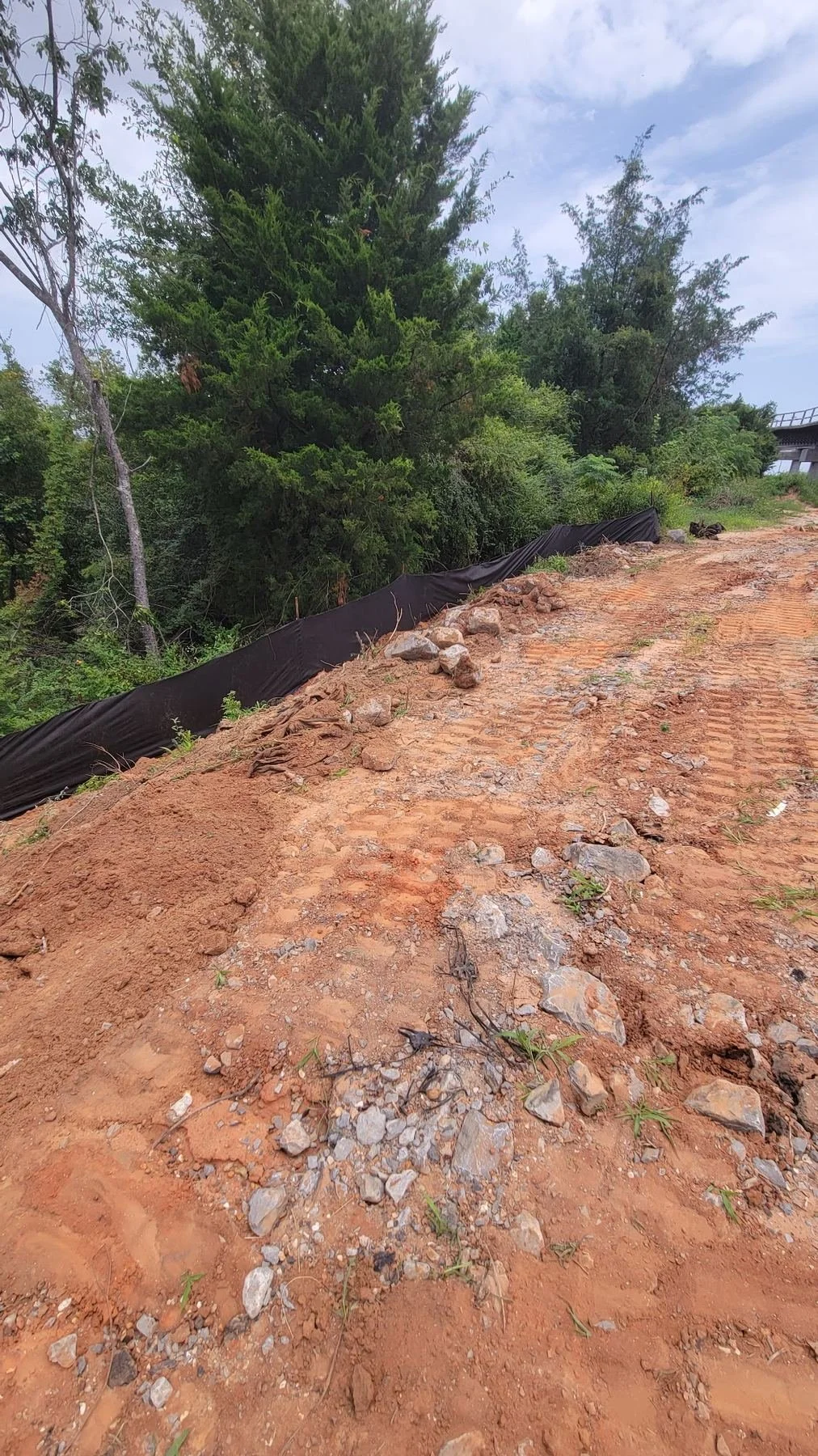 Erosion and sediment control, Mobile, AL — slope stabilization in progress, Hughes 360 Services