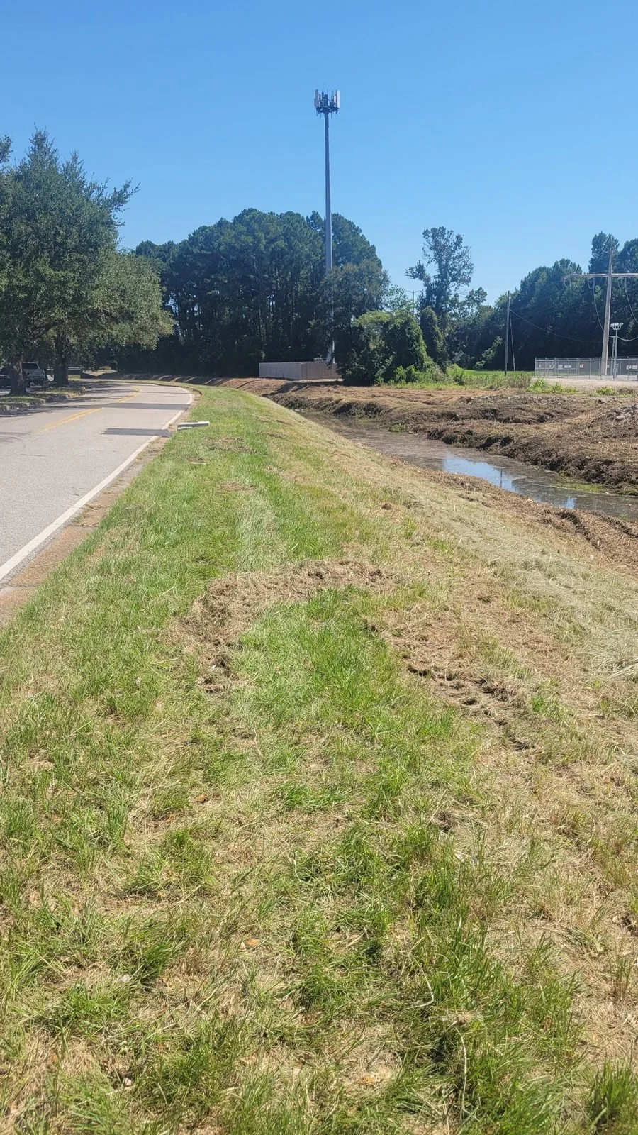 City of Mobile storm drainage ditch clearing — finished canal clearing, Hughes 360 Services
