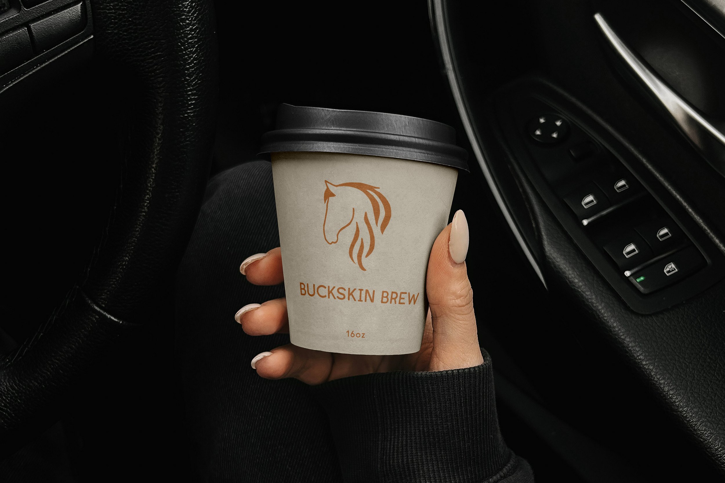 Free Paper Coffee Cup in the Car Mockup.jpg