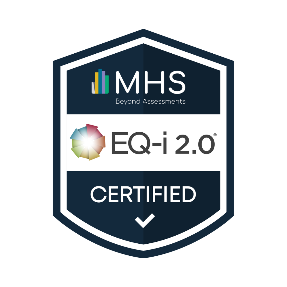 A badge with the MHS logo, labeled 'Beyond Assessments,' indicating certification for EQ-i 2.0, with a color wheel graphic and a check mark, signifying certification.