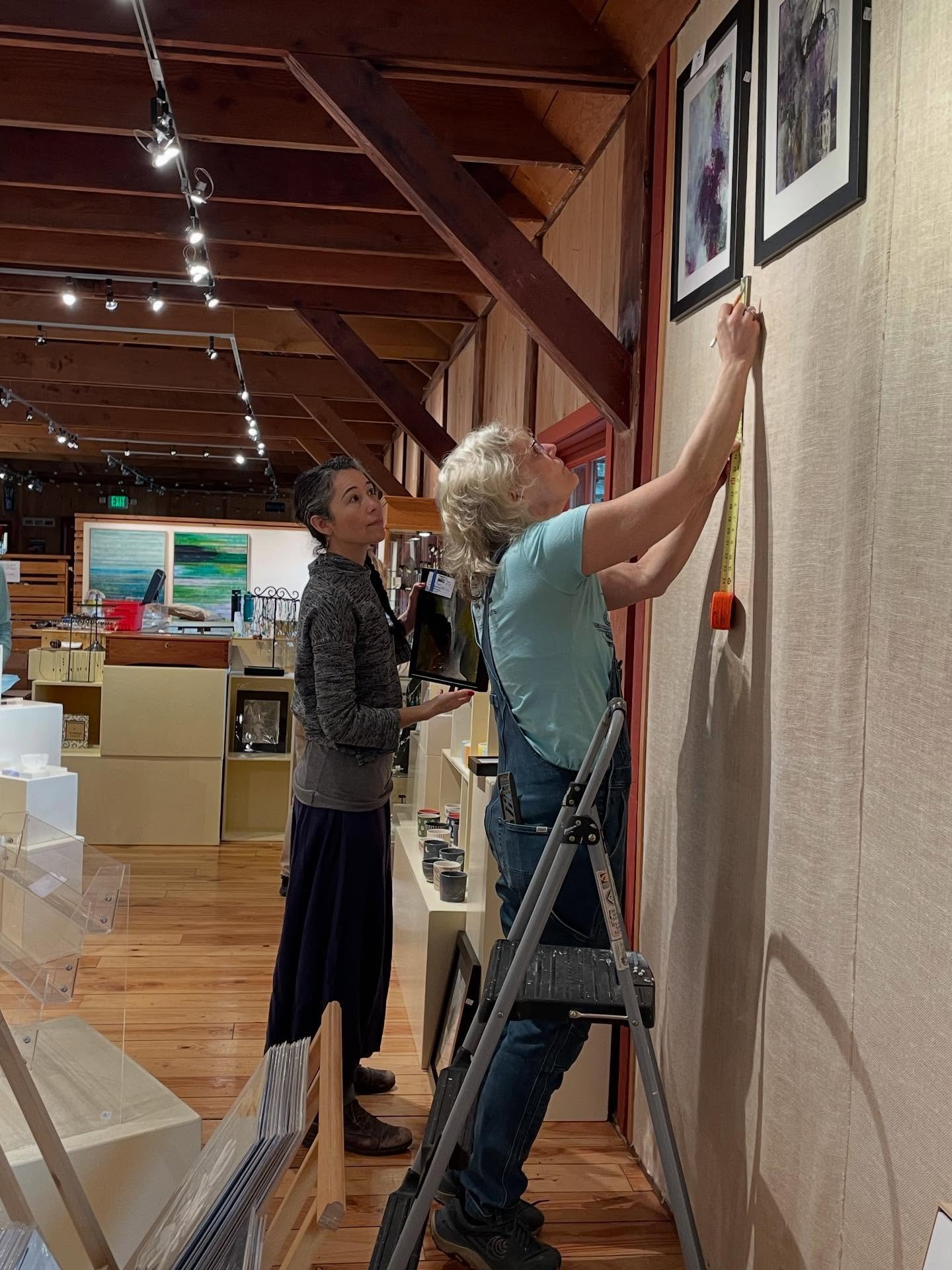 It's a flurry of work at the gallery installing new artwork for a new season. Measure twice, hang once! We'll be ready Feb 12.