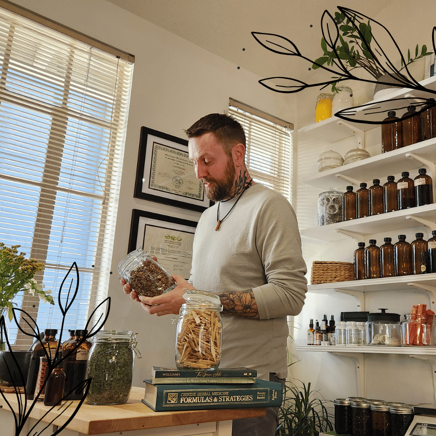 Herbalist making herbal medicine in an apothecary