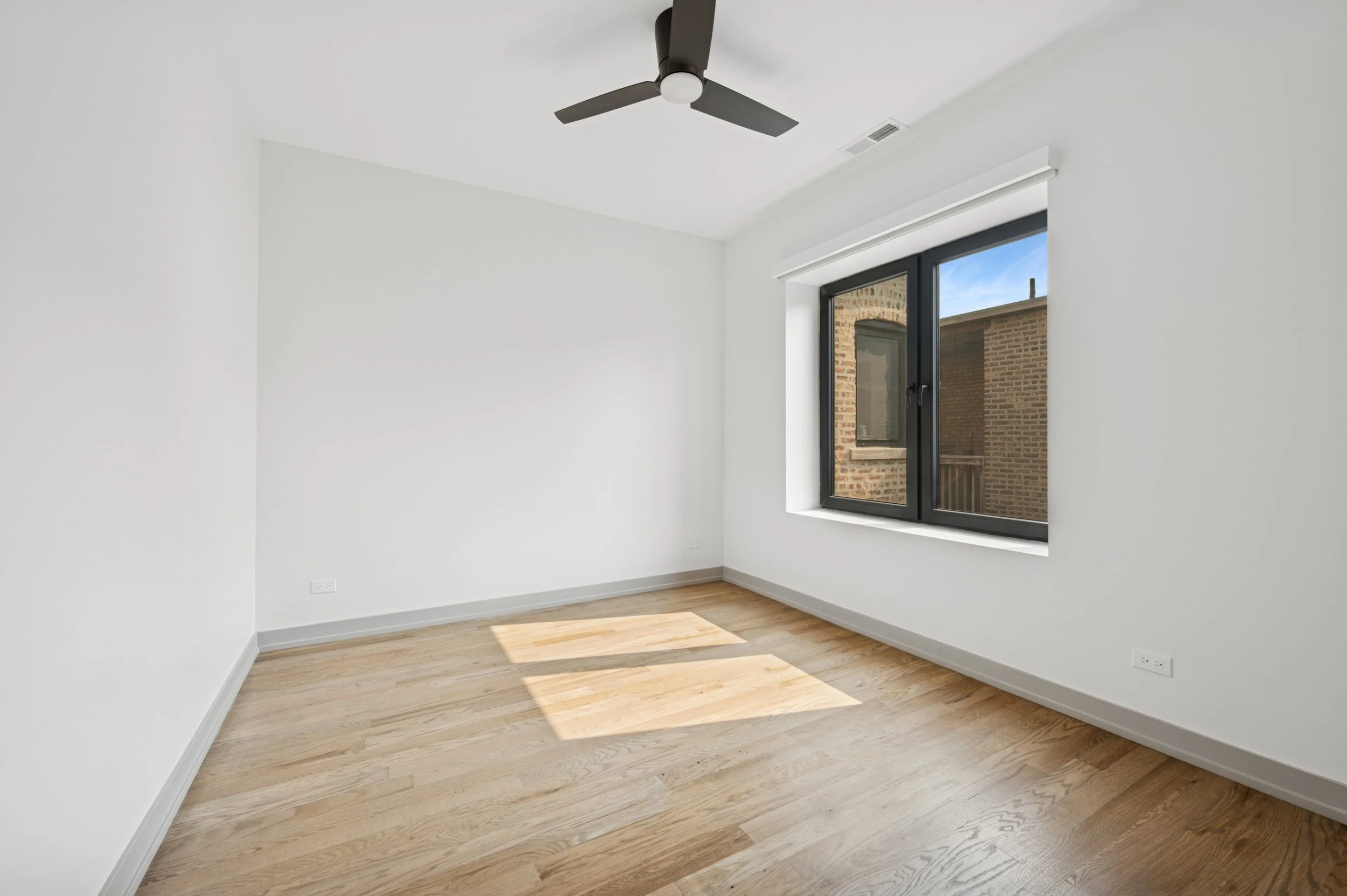 13_1331WEstesAve_Unit3A_14_PrimaryBedroom_HiRes.jpg