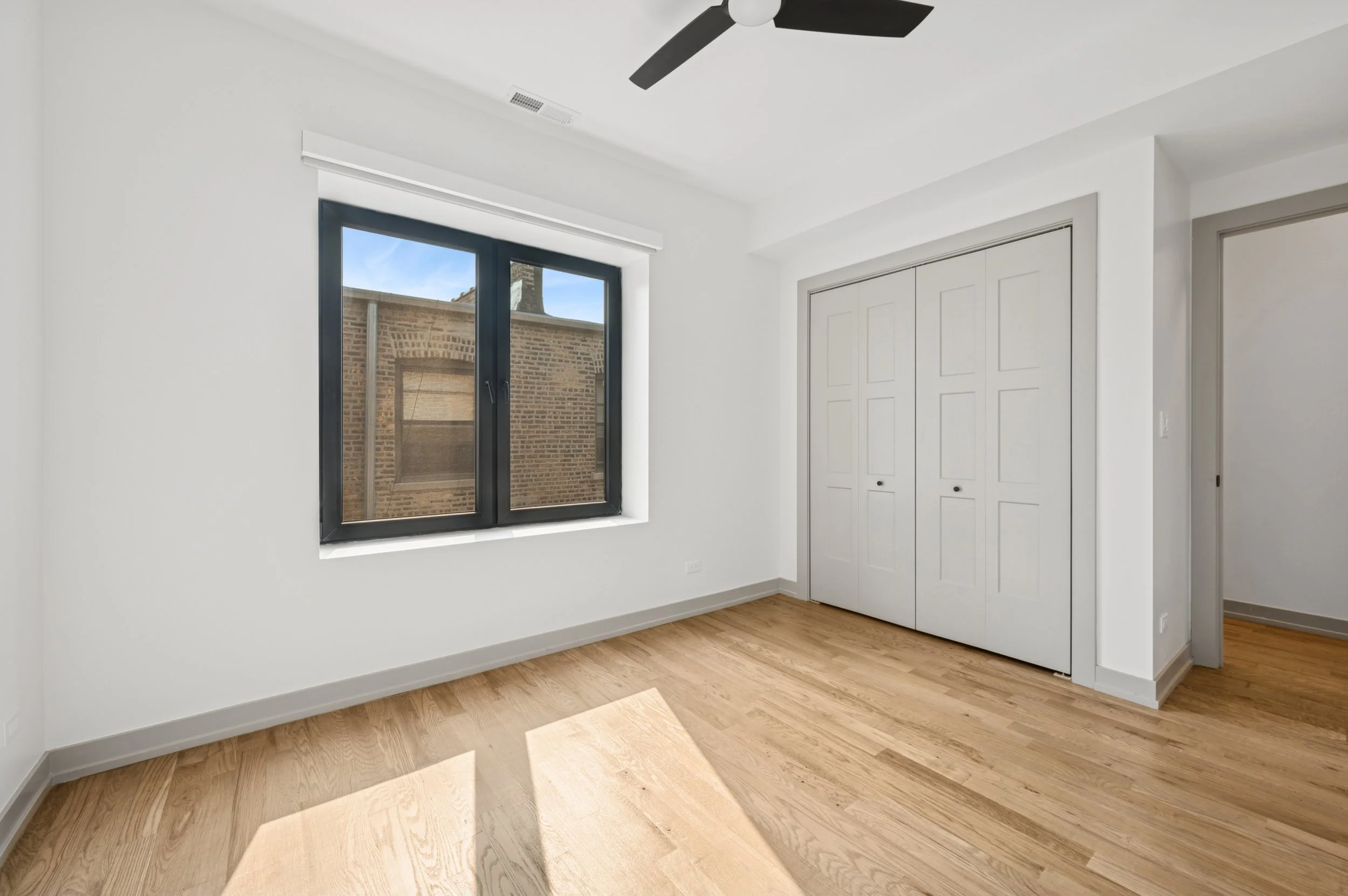 14_1331WEstesAve_Unit3A_178_PrimaryBedroom_HiRes.jpg