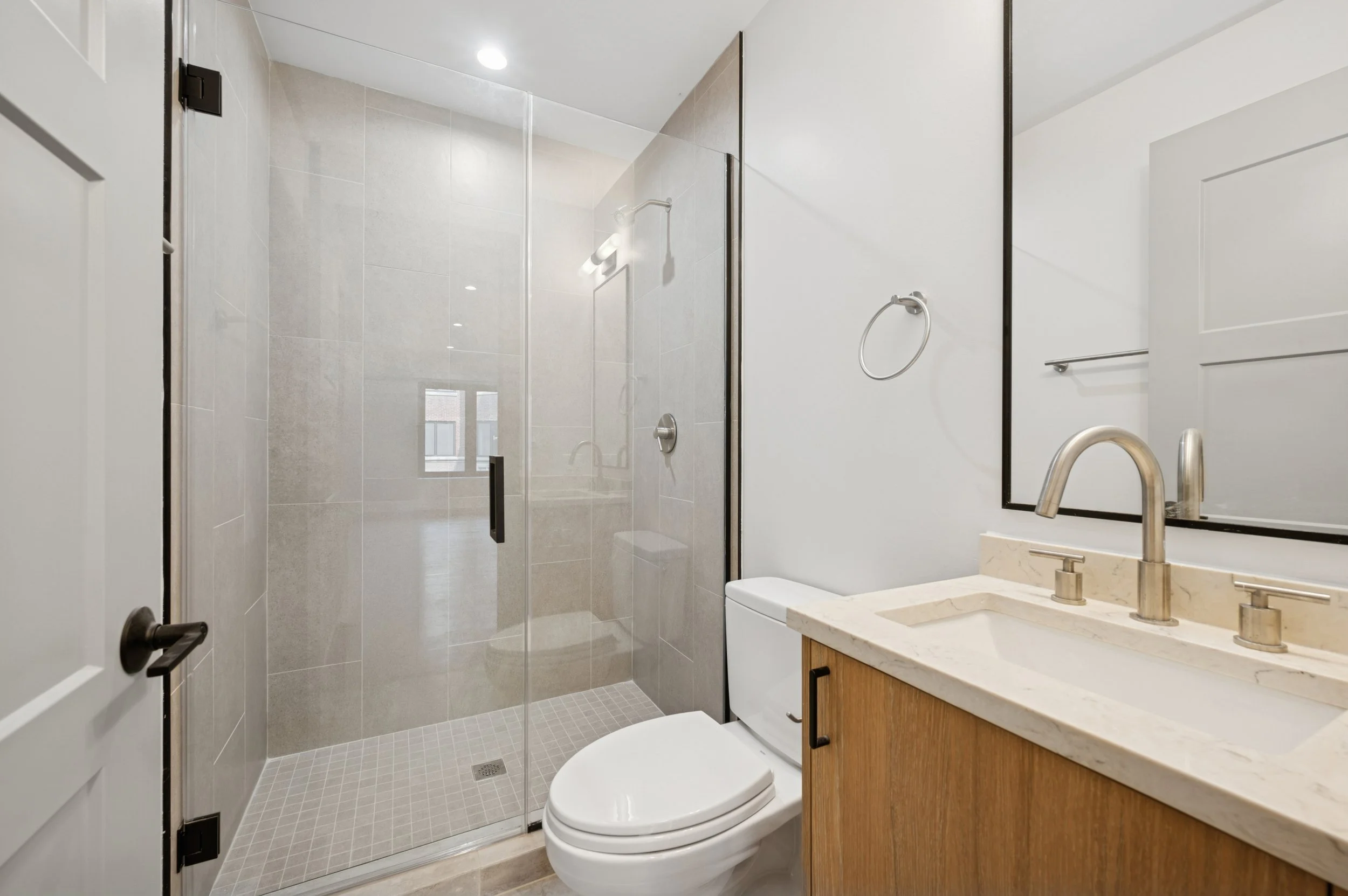 18_1331WEstesAve_Unit3A_10_3rdBathroom_HiRes.jpg