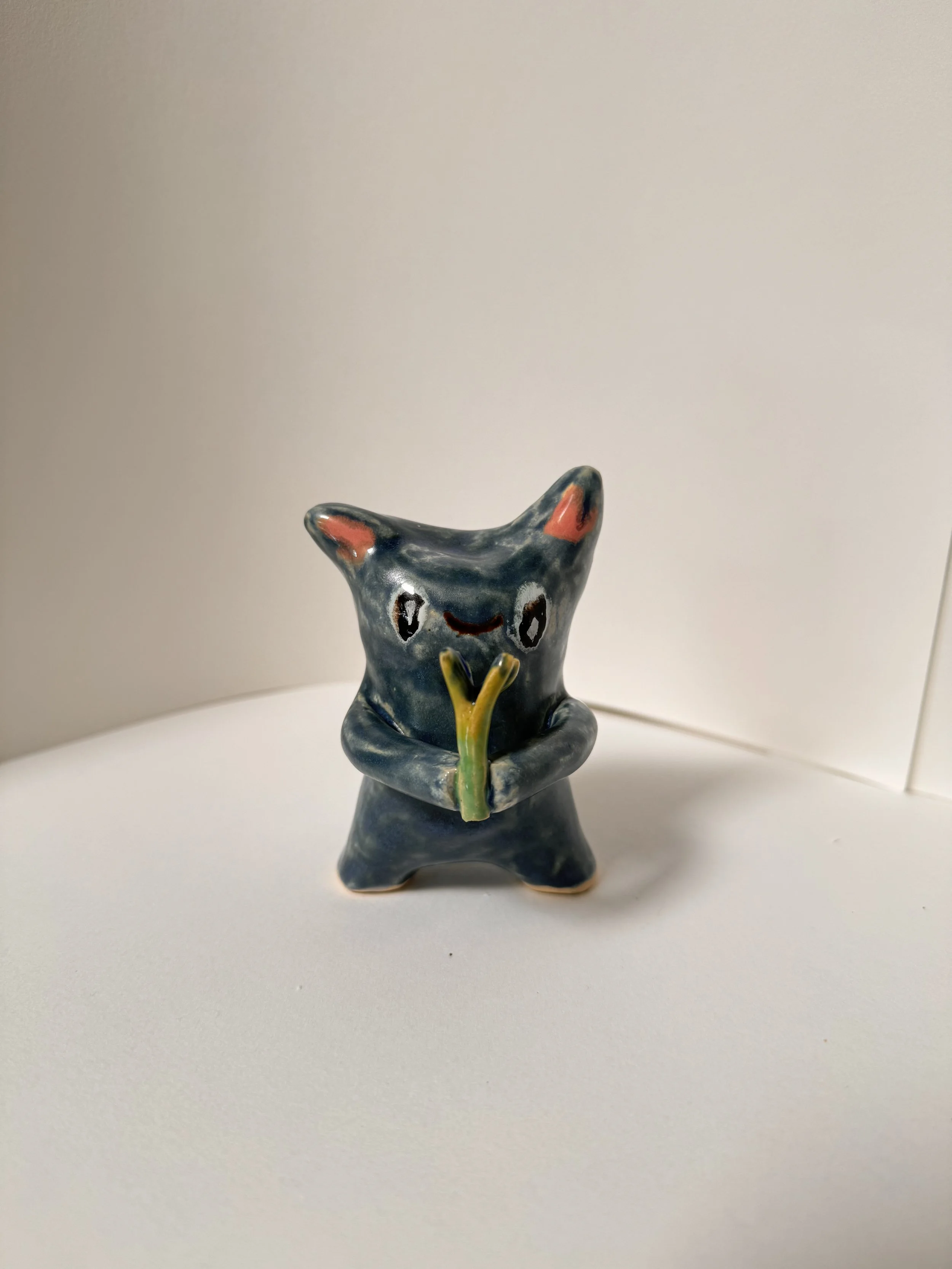 Moon Alien Holding Outer Space Flower