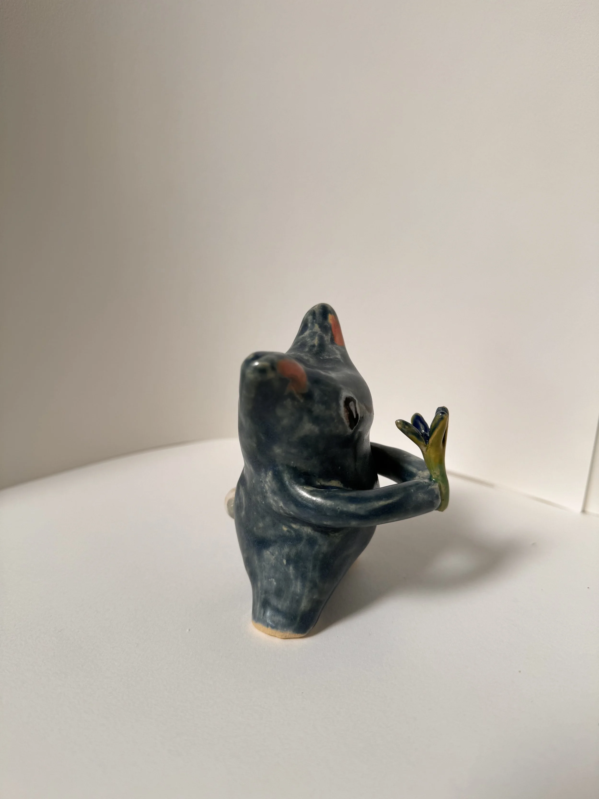 Moon Alien Holding Outer Space Flower