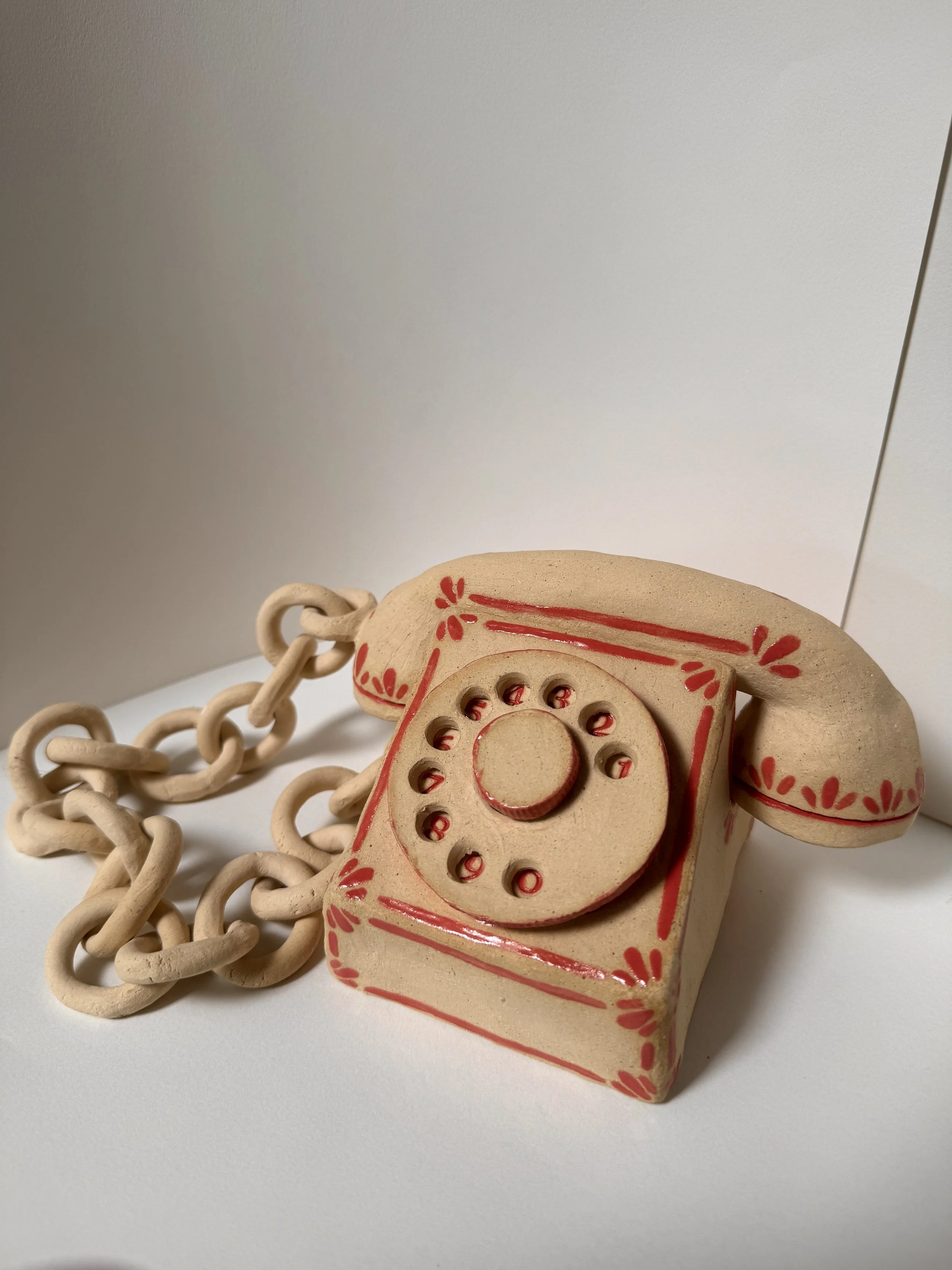 Telephone With Moving Dial and Phone