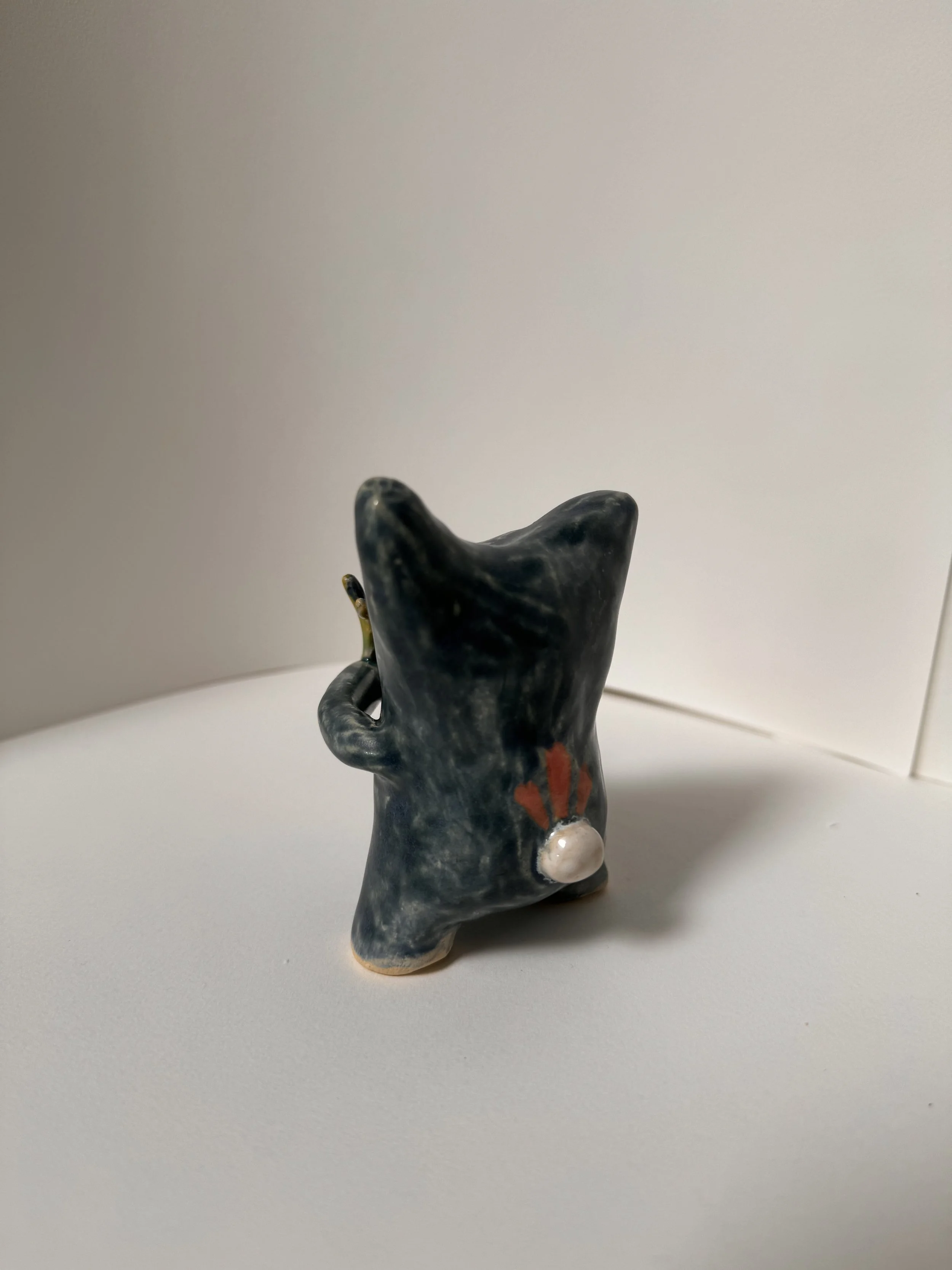 Moon Alien Holding Outer Space Flower