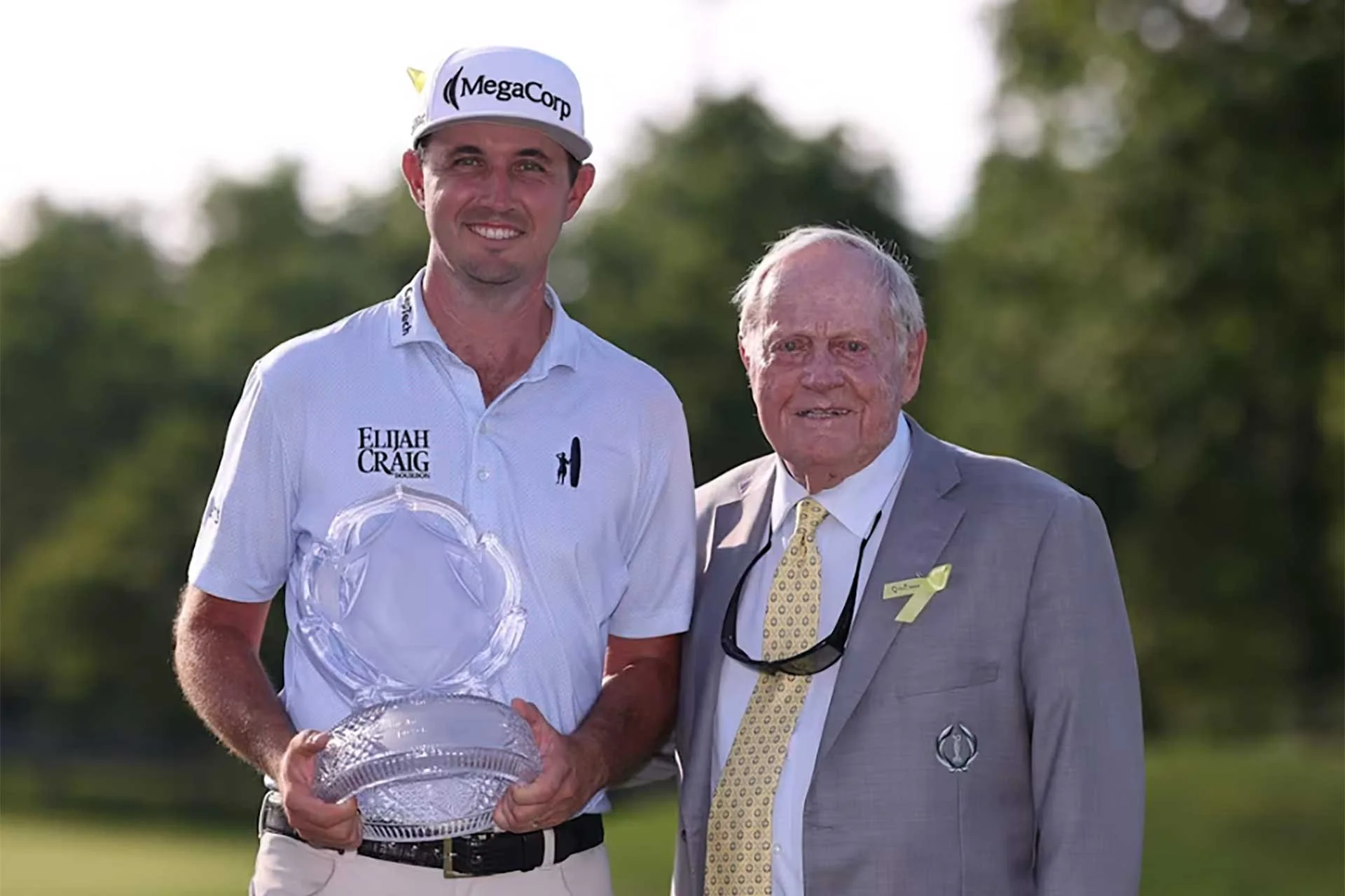 POSTON WINS MEMORIAL AS MCILROY TIED 12th