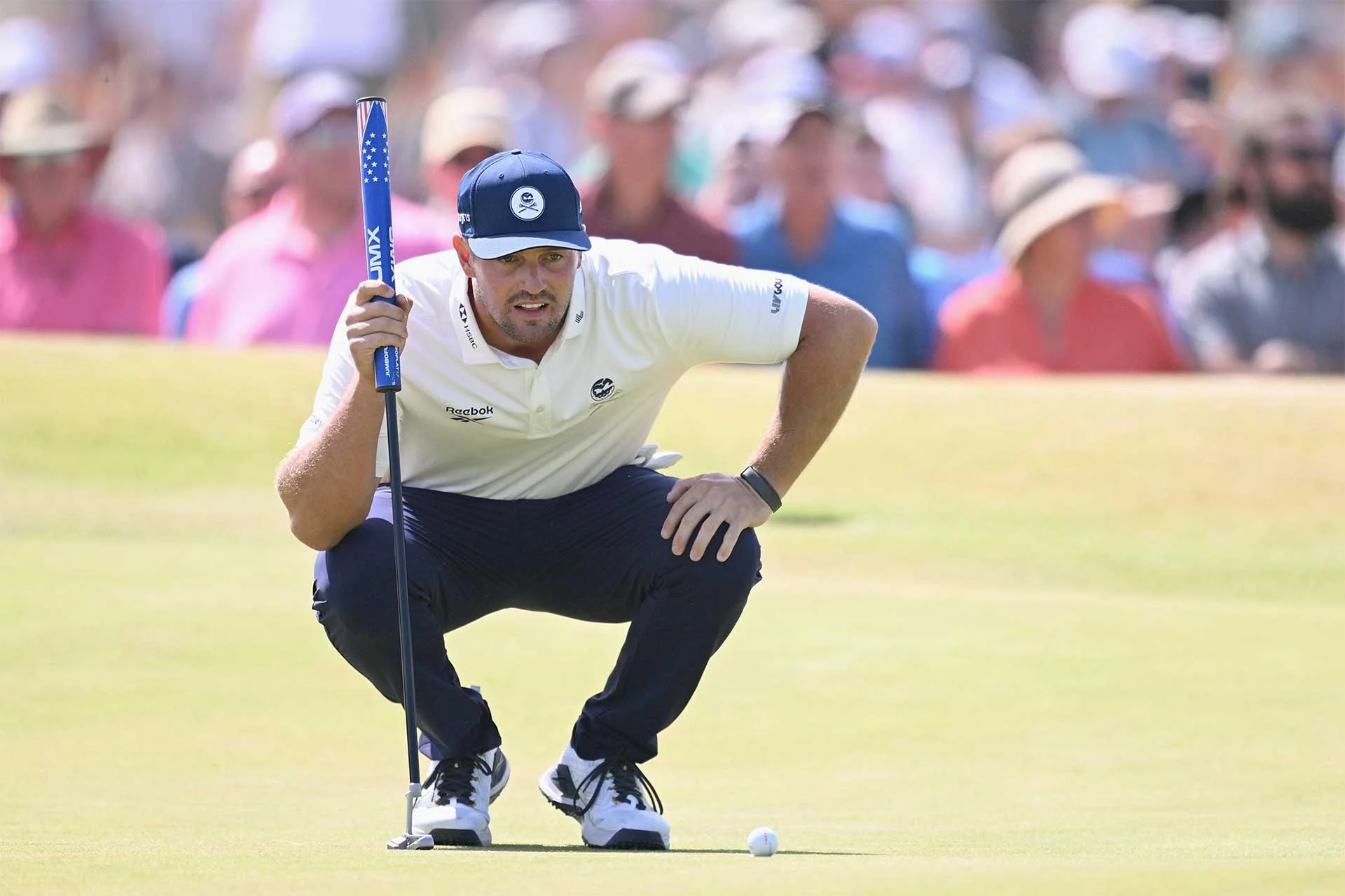 DECHAMBEAU HIT WITH TWO-STROKE PENALTY AT THE OPEN