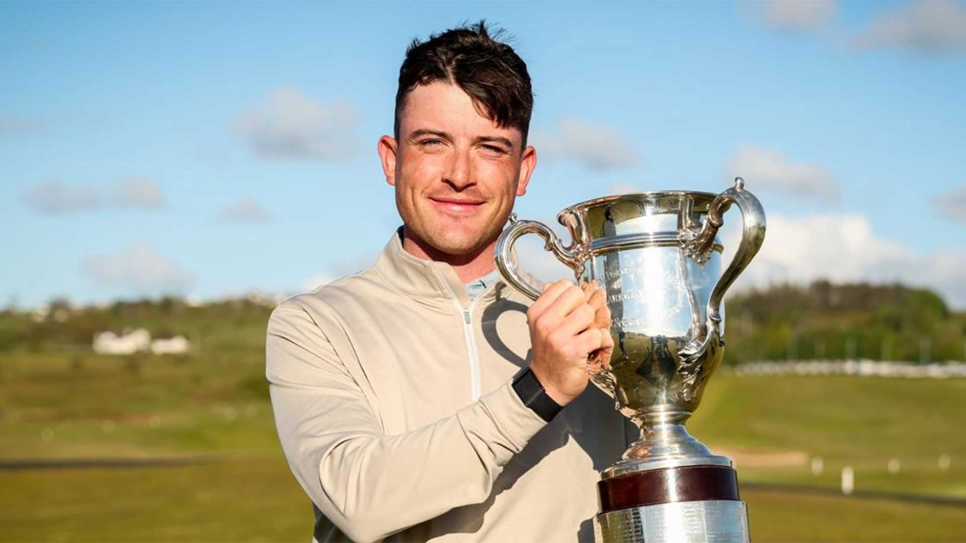 Seapoint’s Dylan Keating celebrates winning the North of Ireland Men’s Amateur Open Championship at Royal Portrush (Photo: Inpho/Nick Elliot)