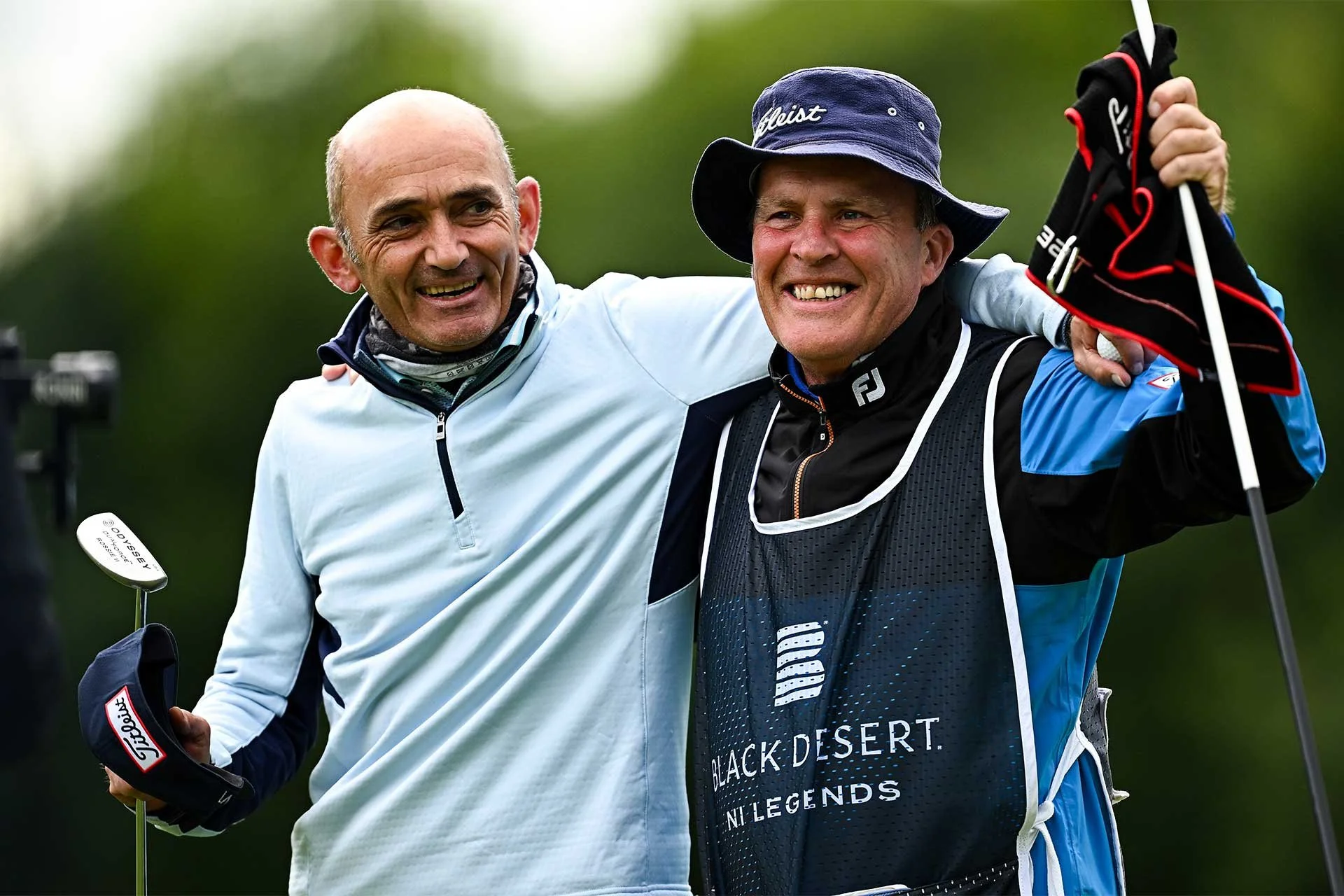 Austria's Markus Brier celebrates winning the Black Desert NI Legends with his caddy at Galgorm (Getty)