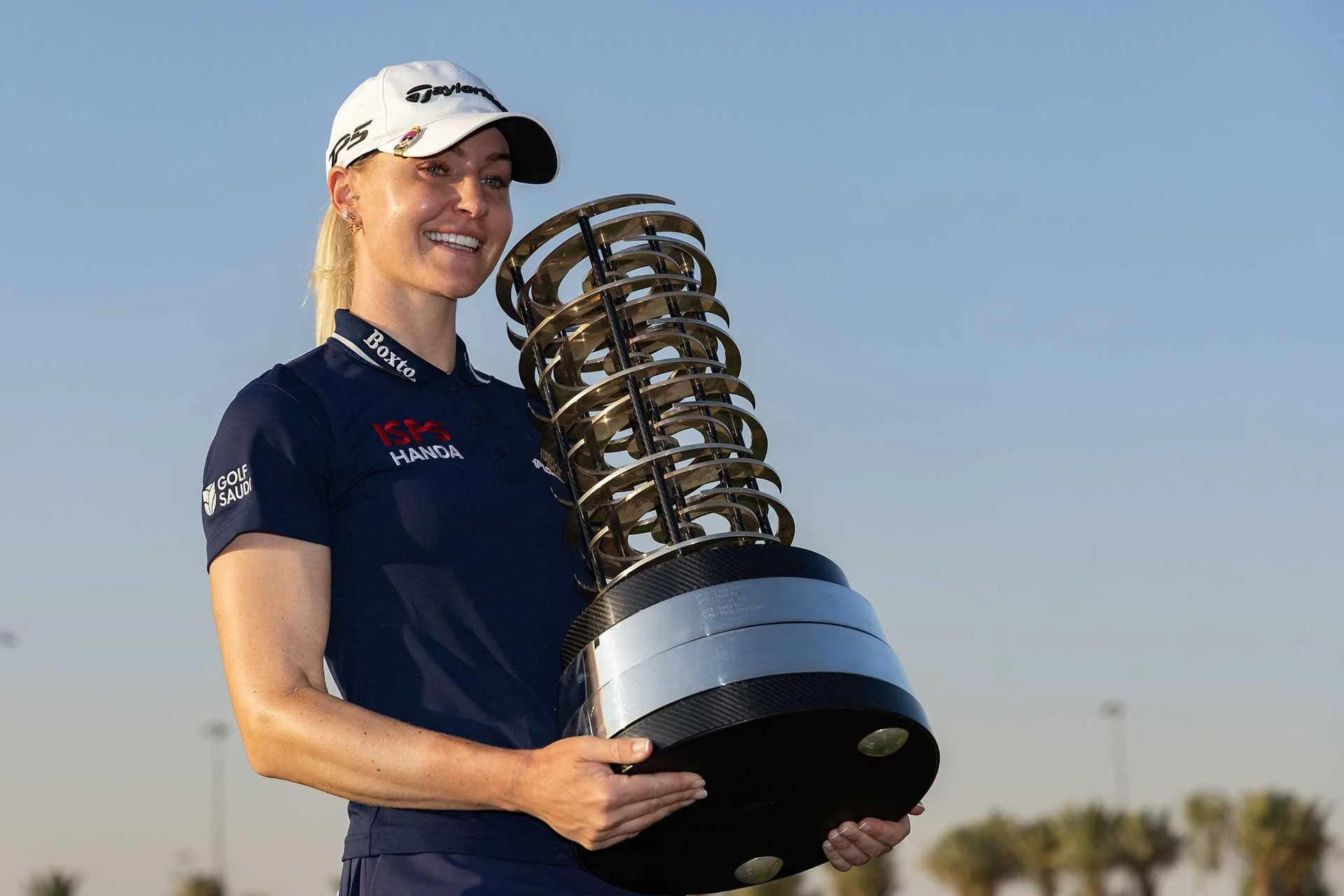 England’s Charley Hull with the trophy after winning the PIF Saudi Ladies International at Riyadh Golf Club (Photo: Tristan Jones/ LET)