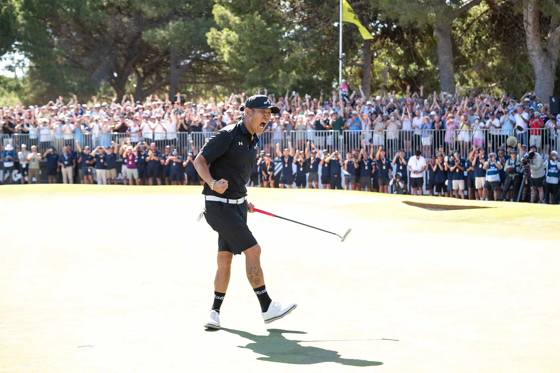 Anthony Kim of 4Aces GC celebrates on the 18th green following his LIV Golf Adelaide win Grange Golf Club in Adelaide, Australia. (Photo by LIV Golf)